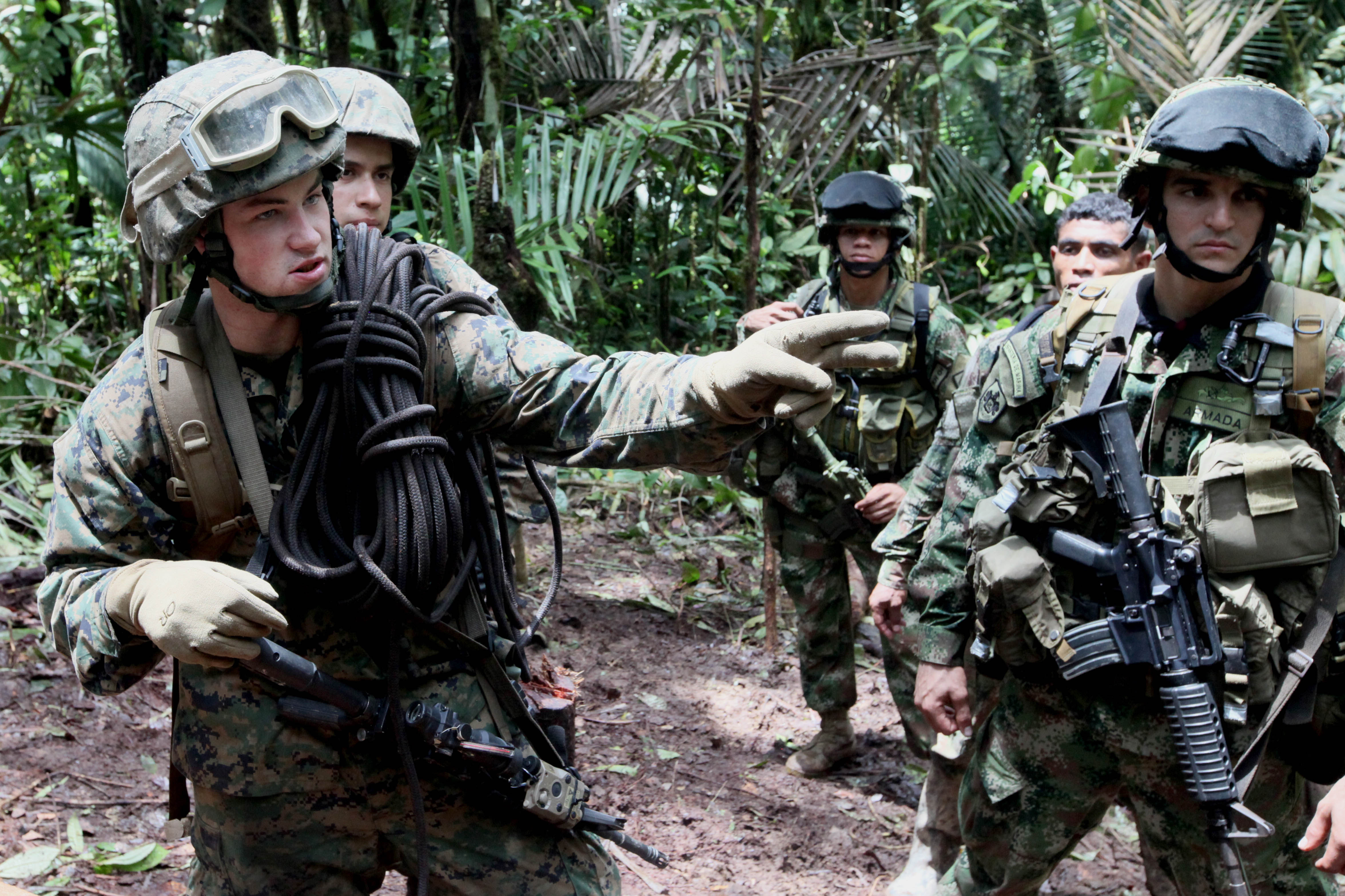 Defense.gov News Photo 100802 M 9093S 030.S. Marine Corps Cpl. Blaho Instructs His Squad On Where To Cross A River While Training With Colombian Marines On Jungle Warfare In Colombia