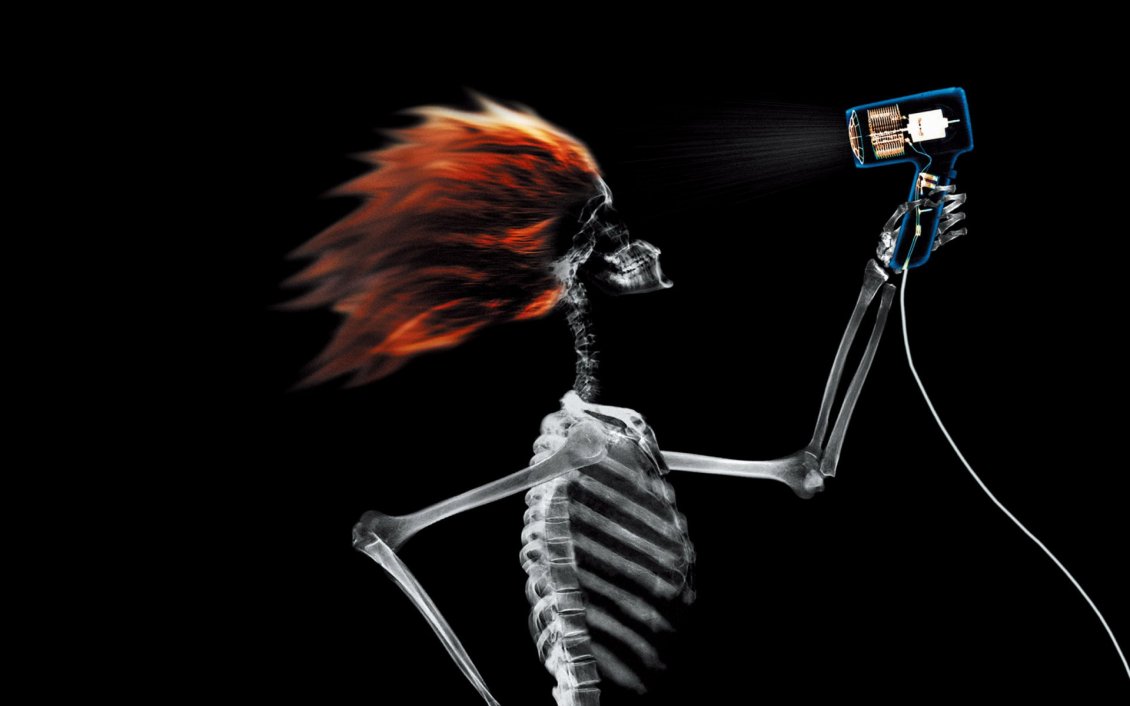 Funny skeleton dry his hair