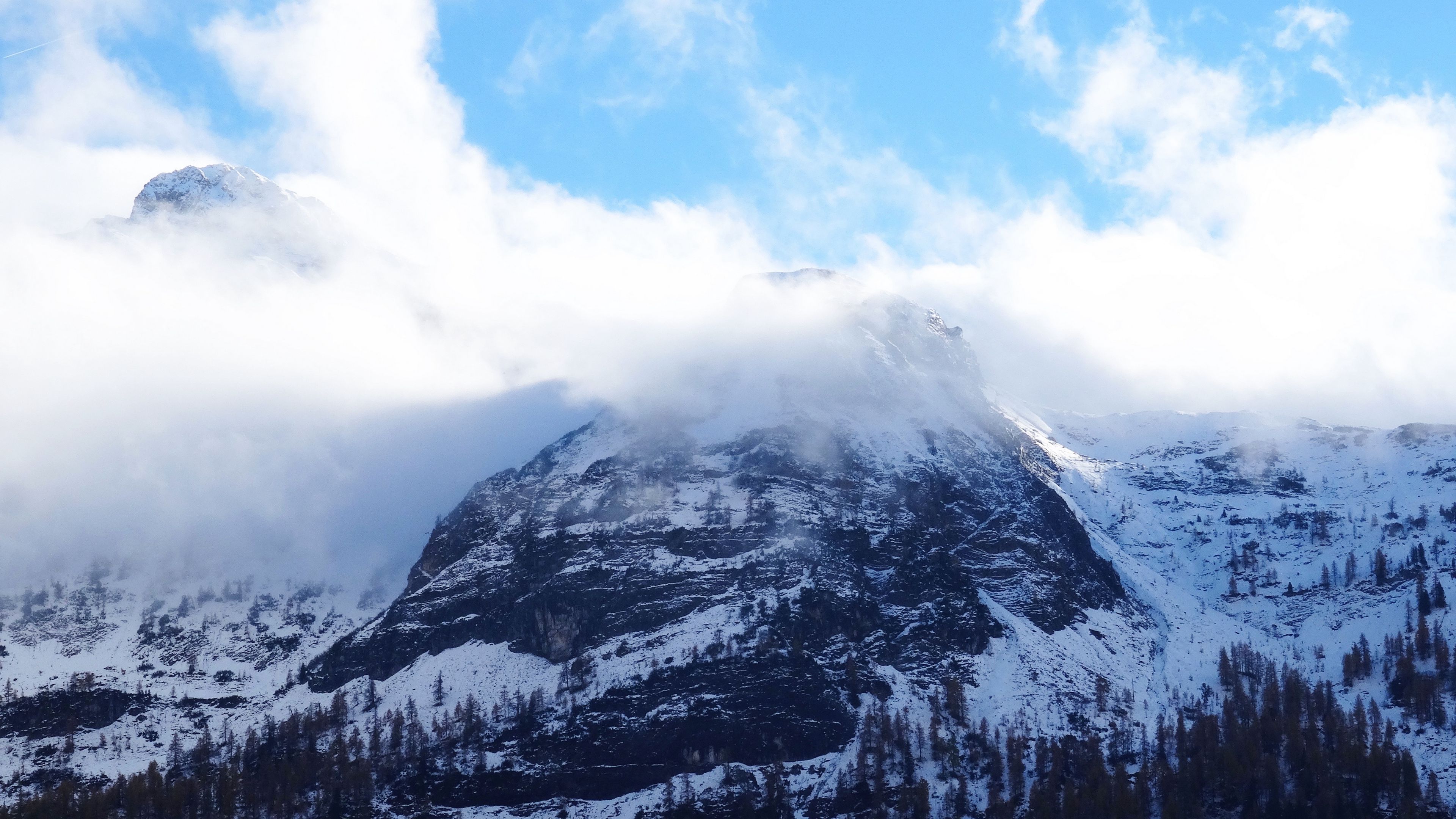 Download wallpaper 3840x2160 mountain, peak, top, snow, fog, sky 4k uhd 16:9 HD background