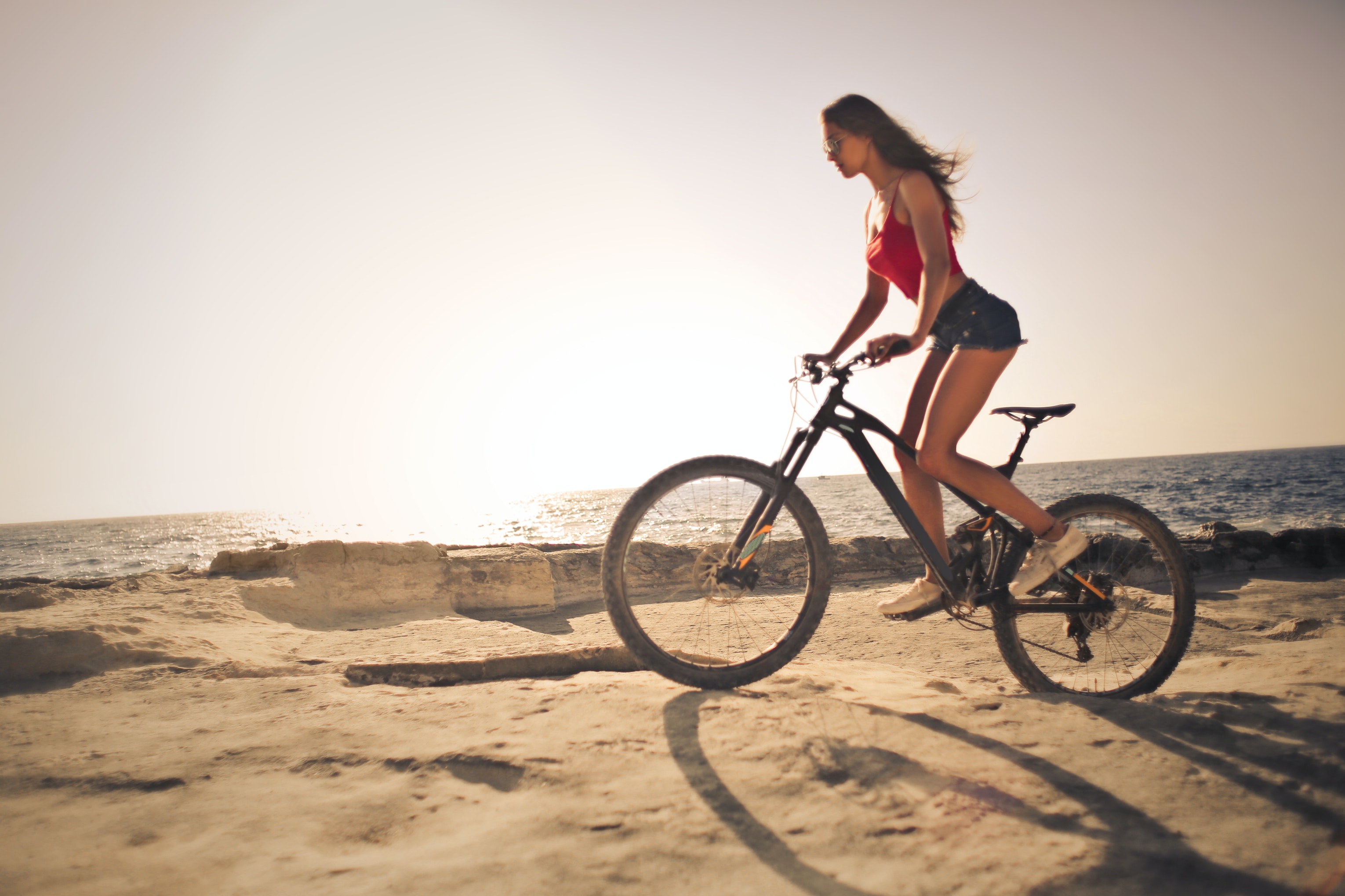 Woman Riding A Mountain Bike · Free