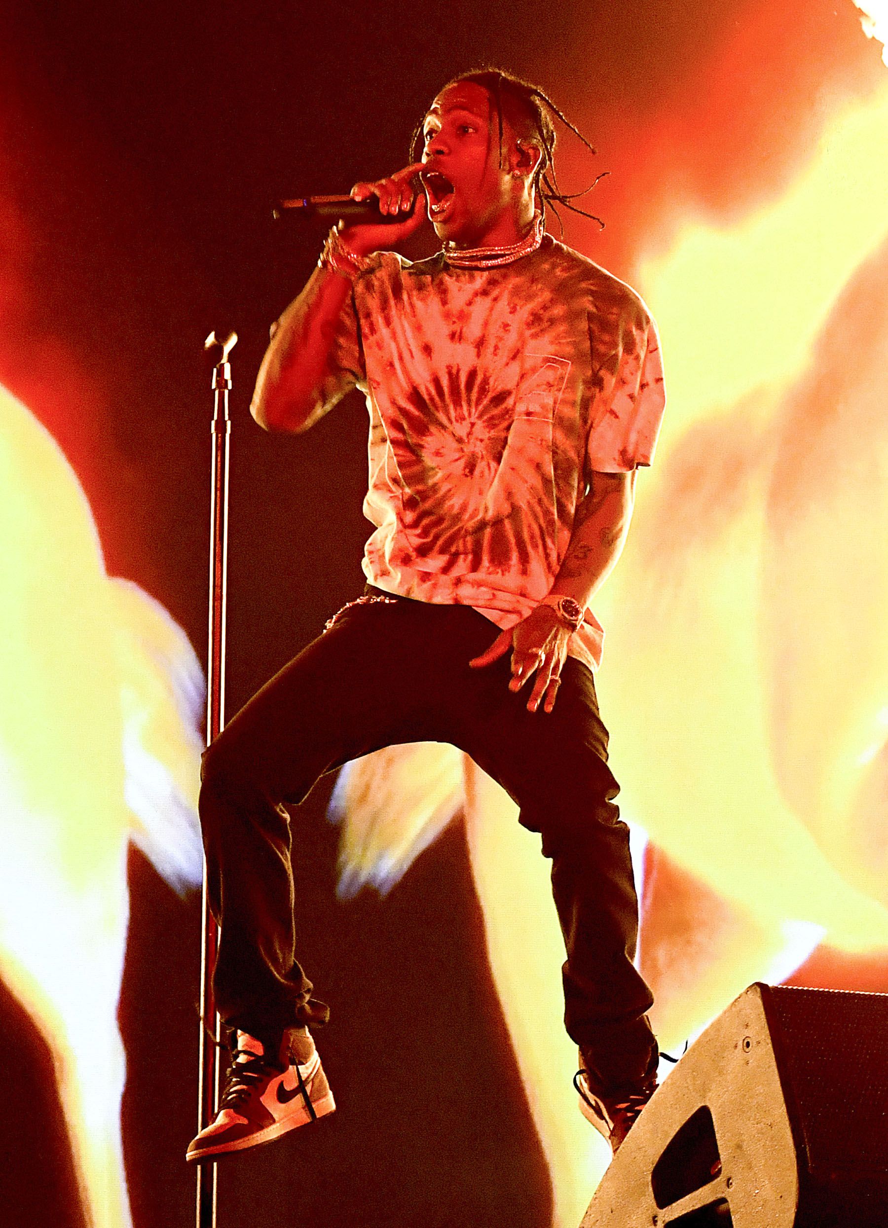 Travis Scott's Fans Injured in Stampede at Astroworld Festival: 'Be Safe Rage Hard, ' Rapper Says. Travis scott wallpaper, Travis scott iphone wallpaper, Travis scott concert