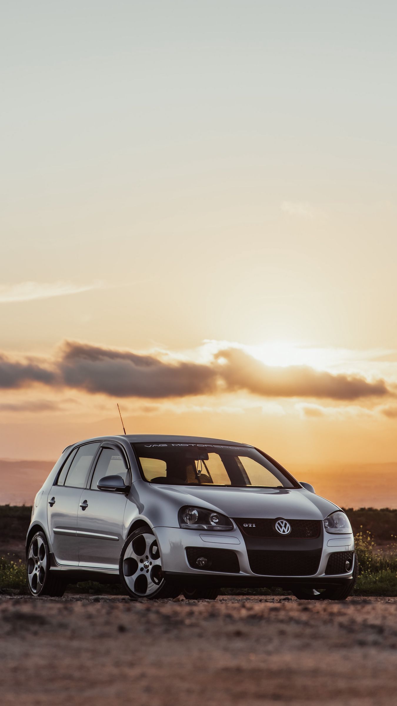 Download wallpaper 1350x2400 volkswagen golf mk5, volkswagen, car, front view, gray iphone 8+/7+/6s+/for parallax HD background
