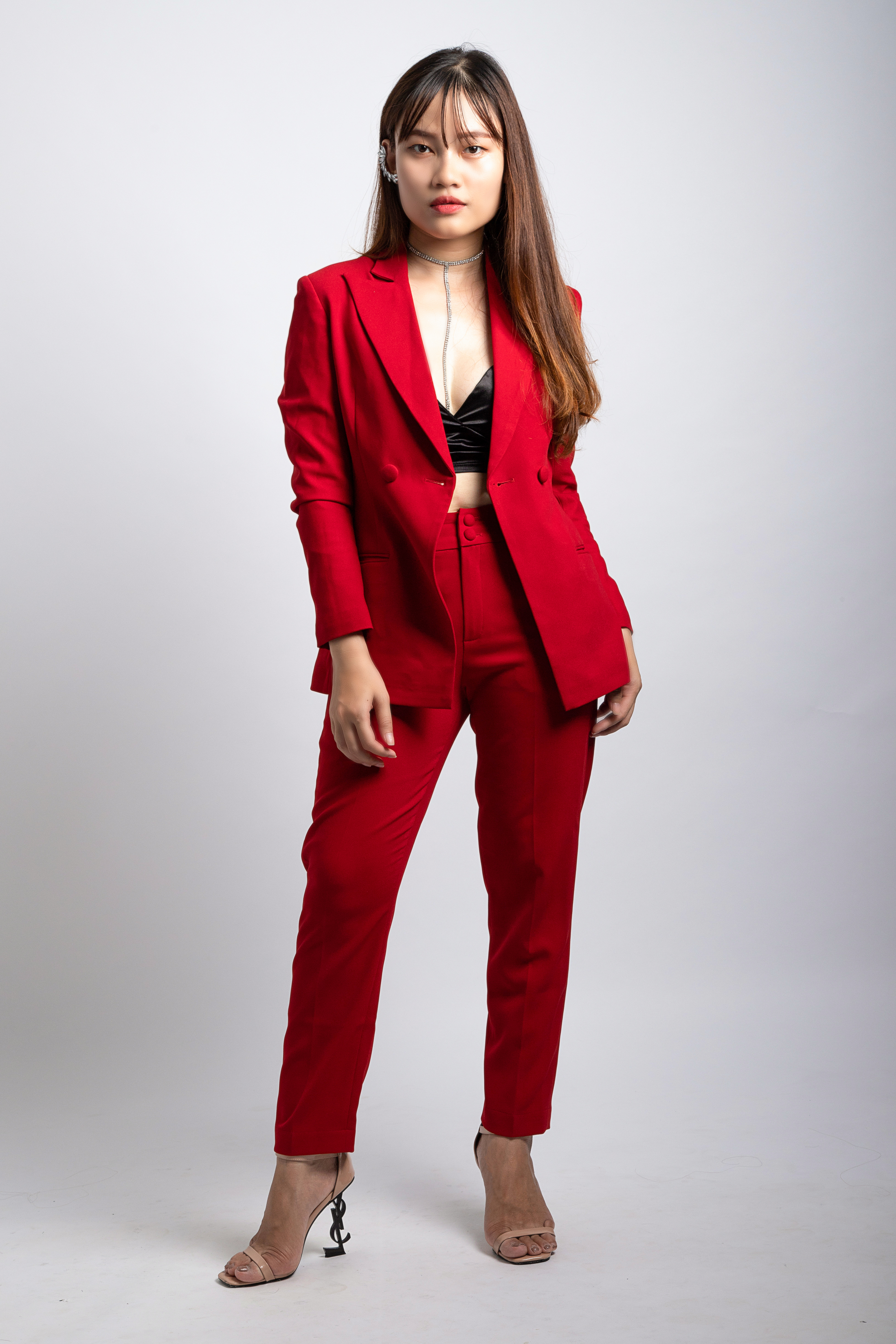 Woman Wearing Red Coat and Dress Pants