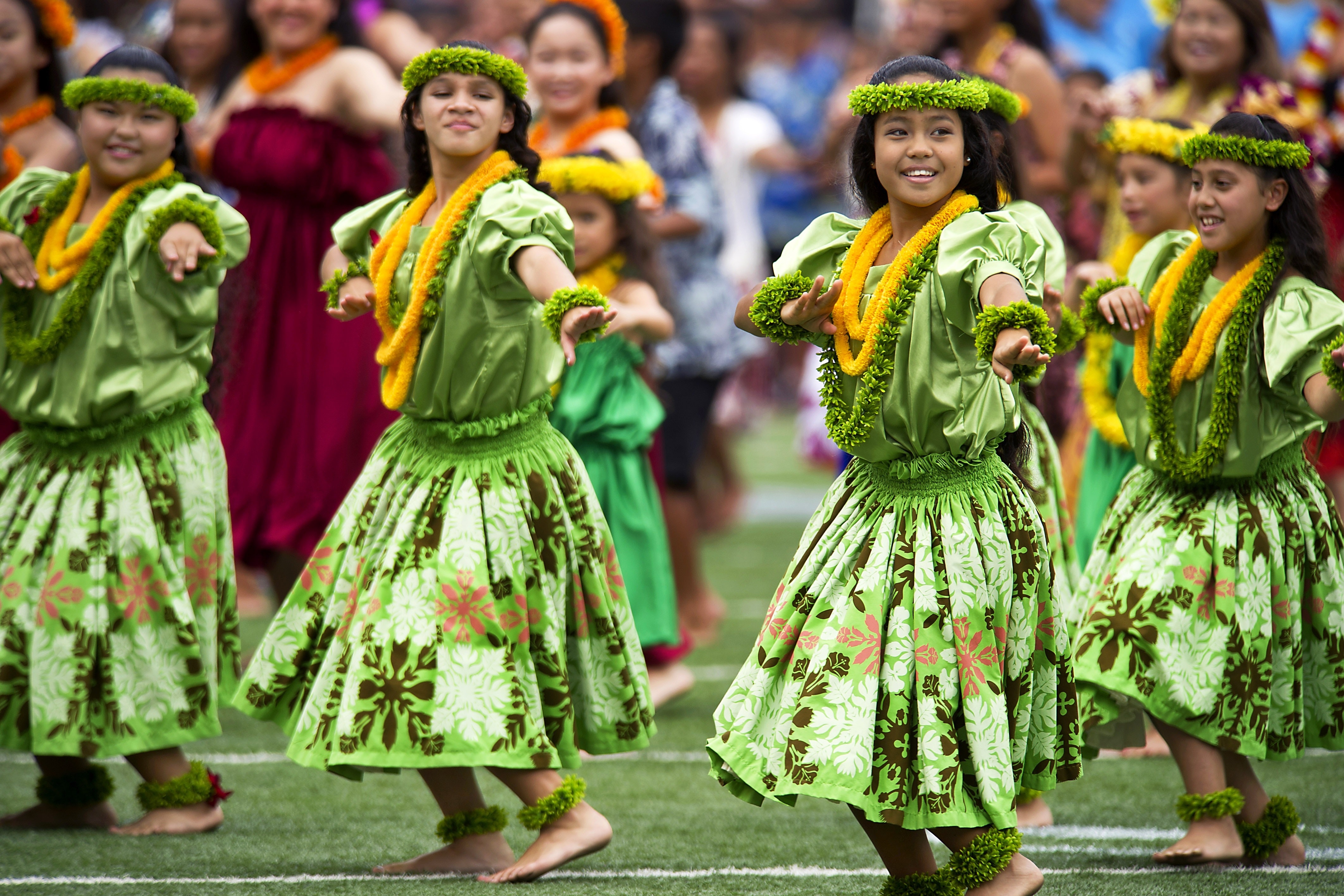 Girl's in Green Dress Dancing during Daytime With Leis · Free