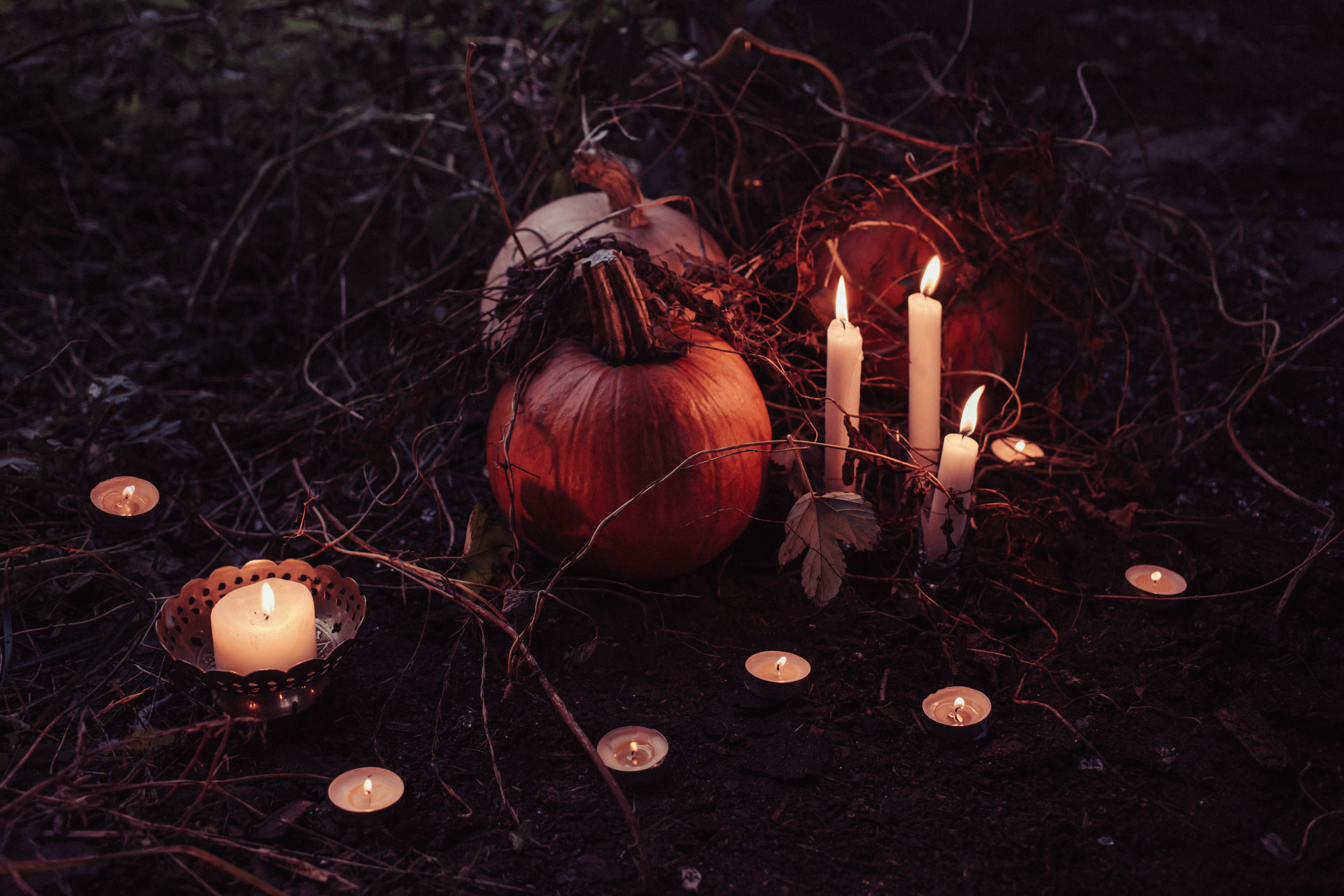 Jack O Lantern Beside Candles Halloween Decor · Free