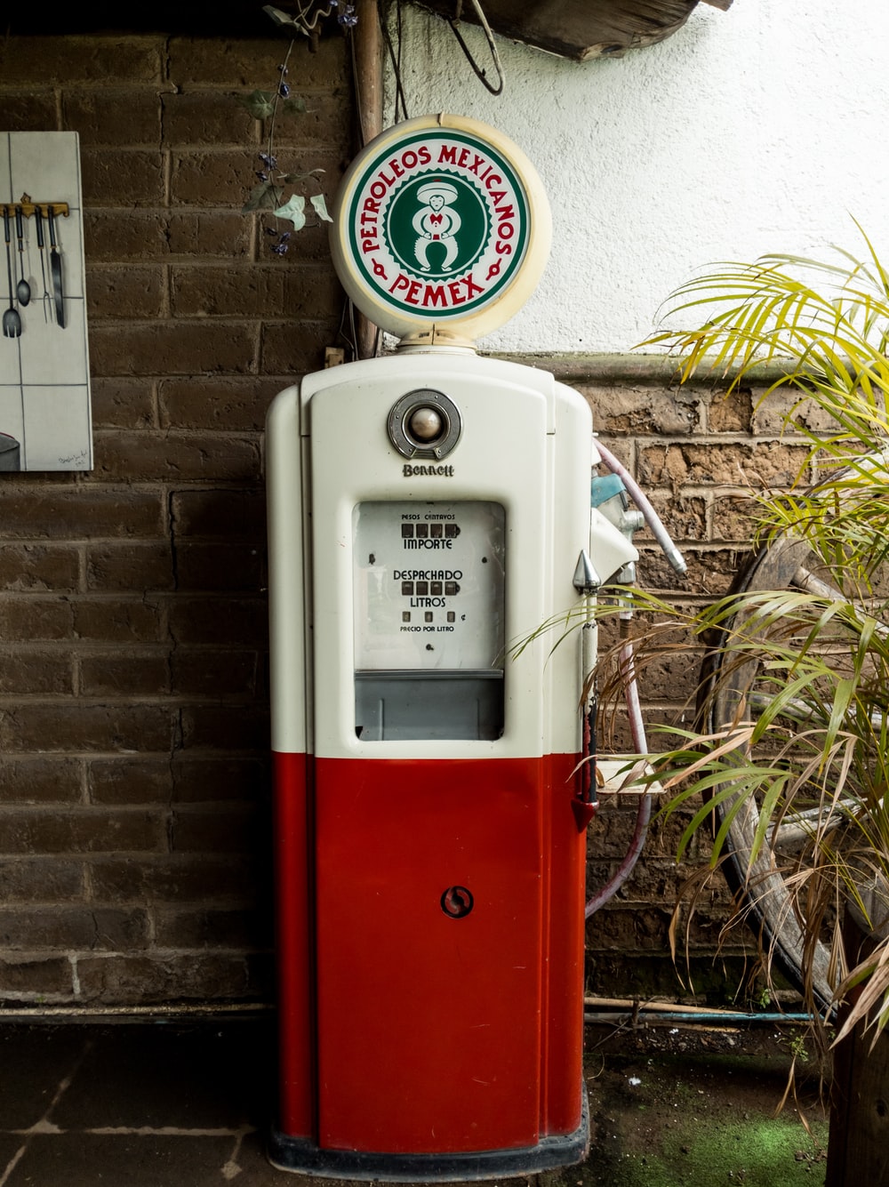 white and red gasoline pump photo