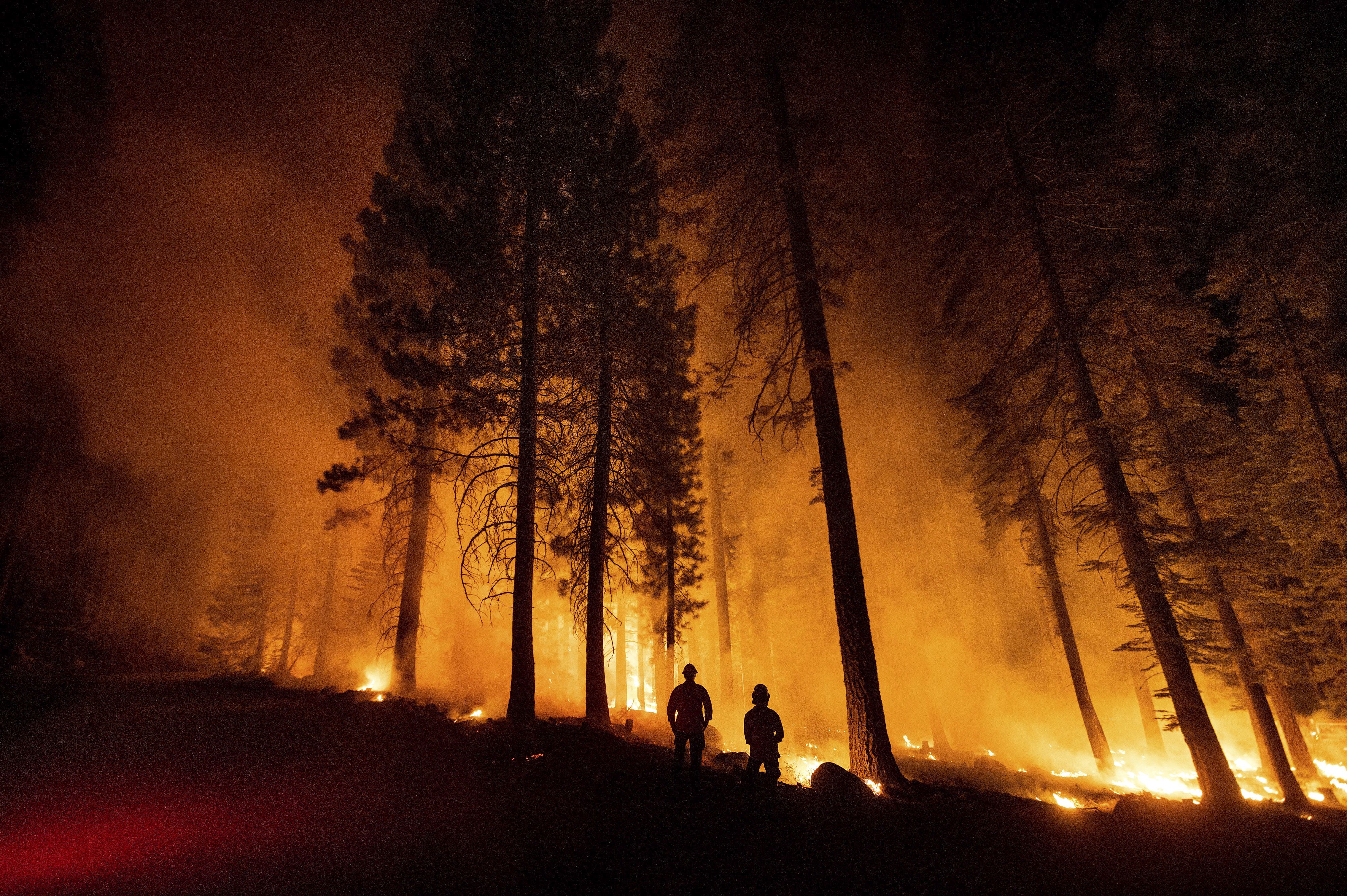 Evacuations lifted as progress made against fires in US West