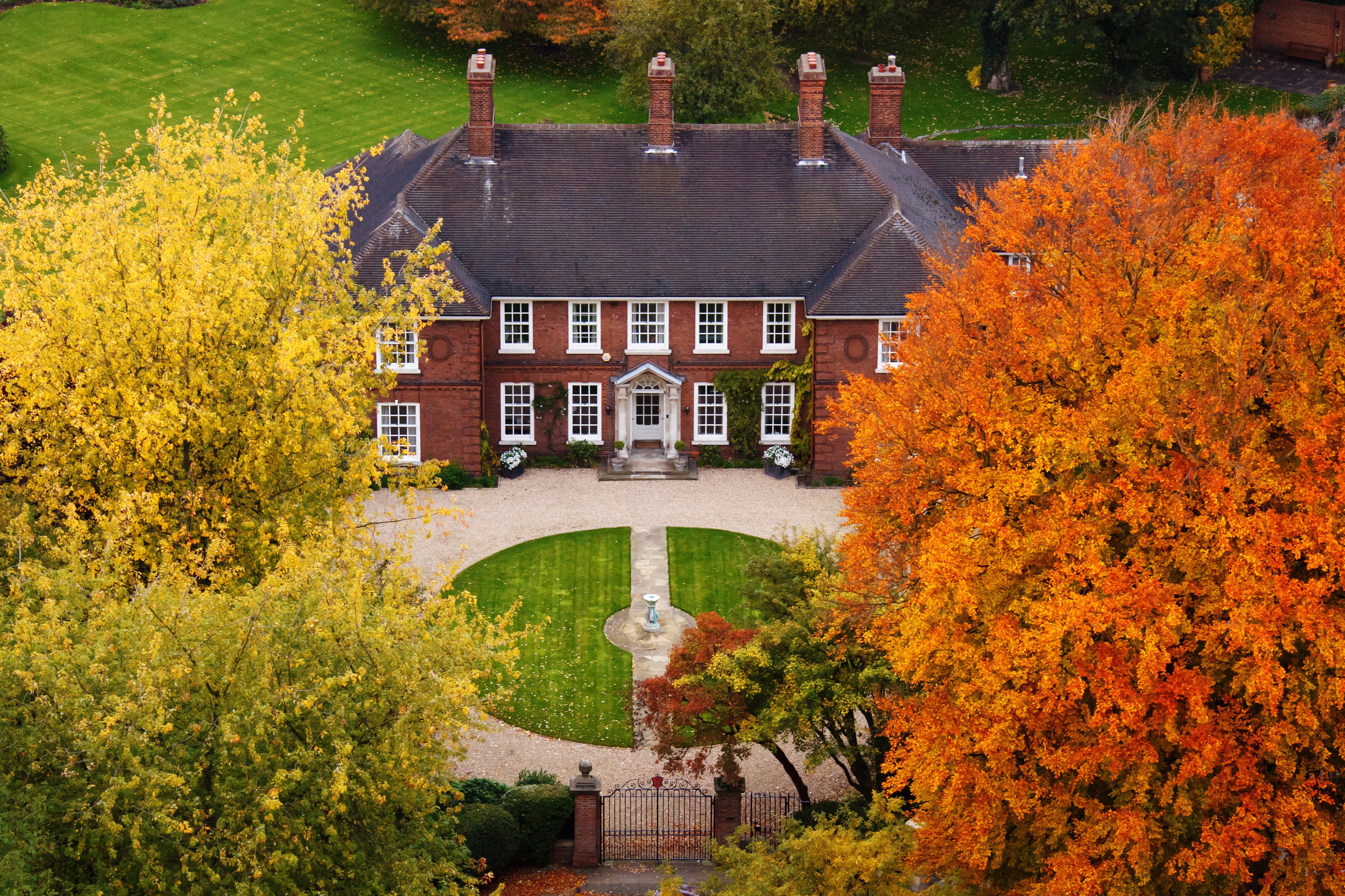 Mansion with autumn trees image Domain photo