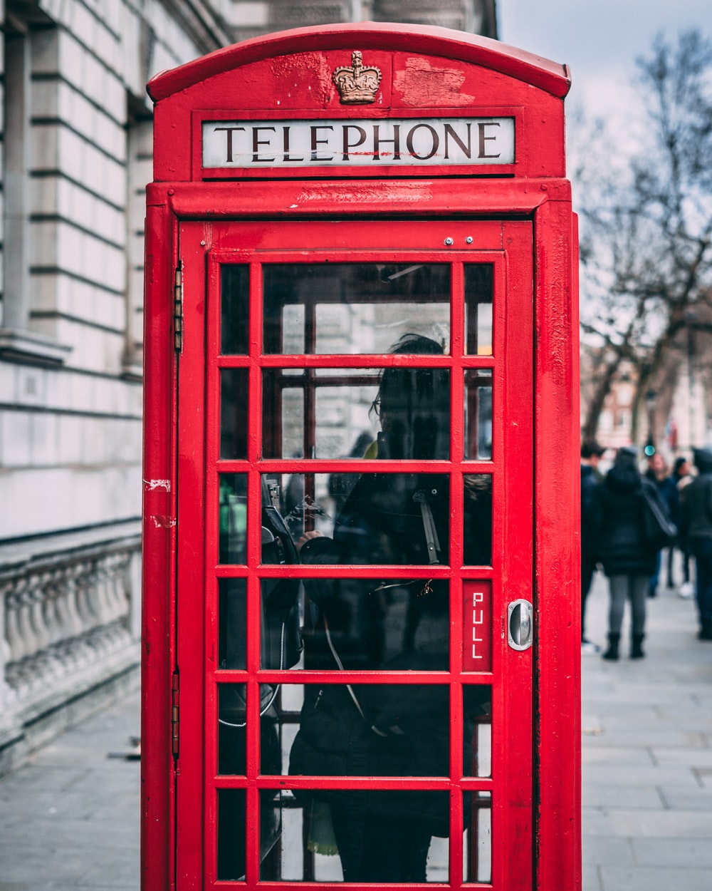 closeup photo of red telephone booth photo