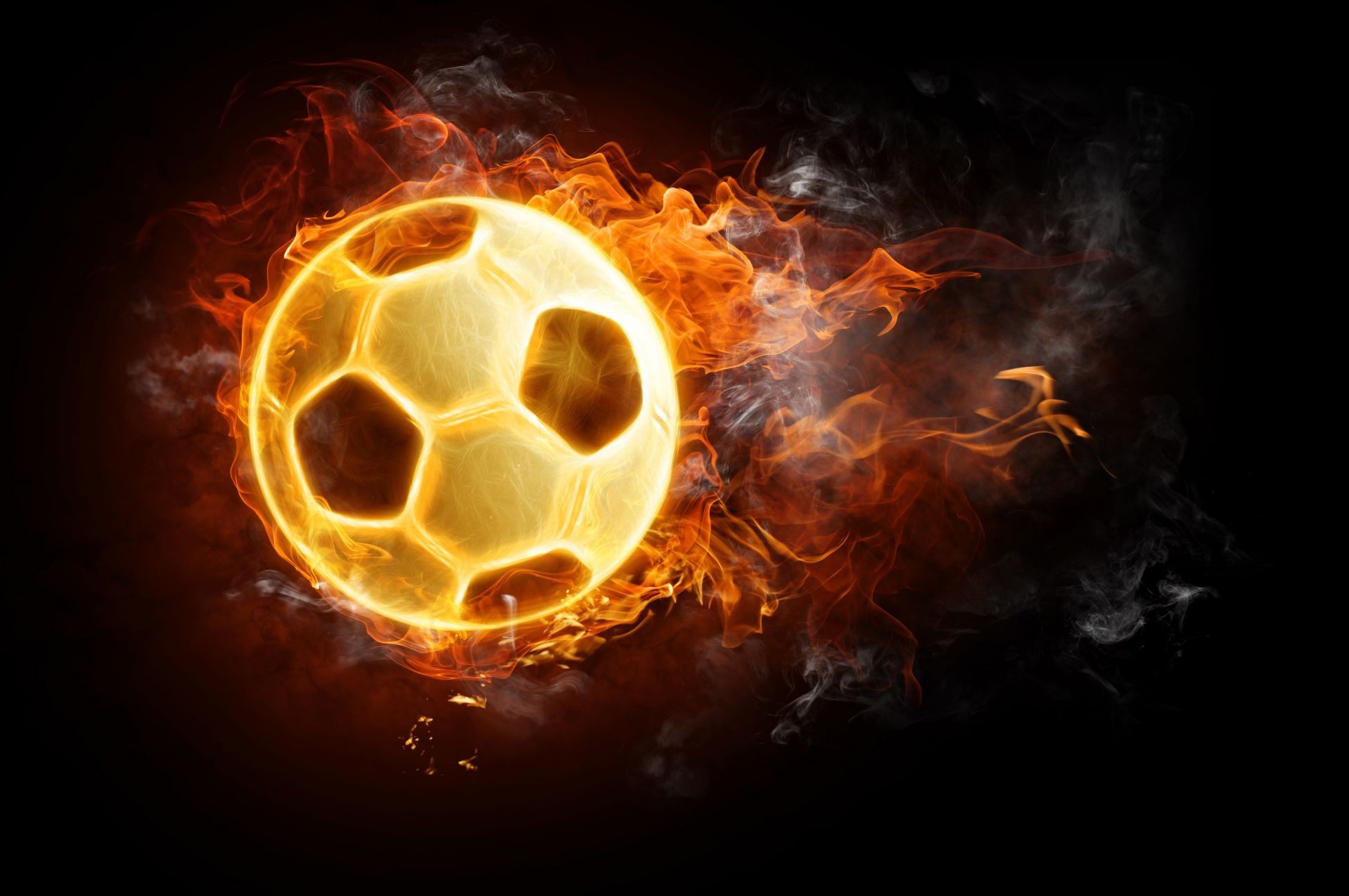 Ball football fire black background tongues of flame