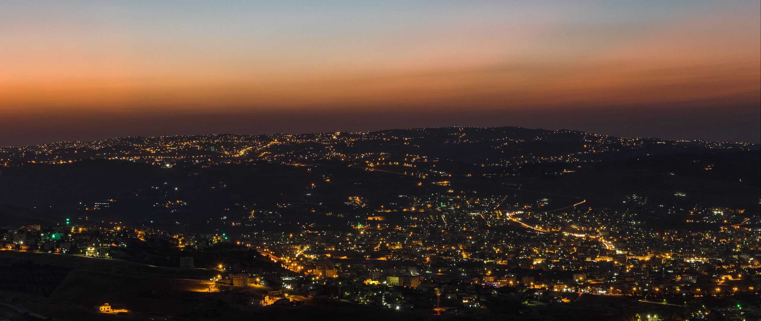 Download wallpaper 2560x1080 night city, city lights, skyline, amman, jordan dual wide 1080p HD background