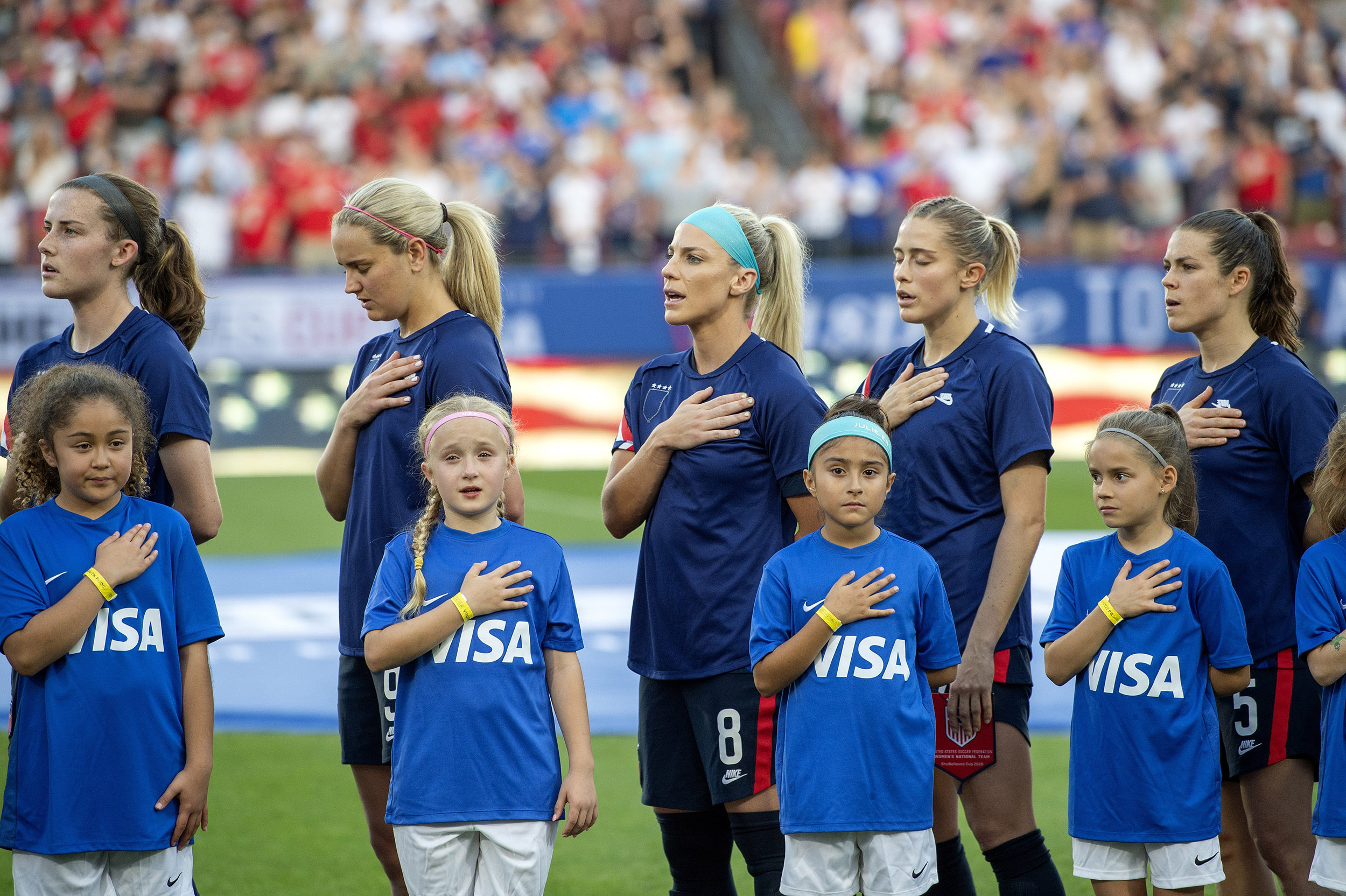 Women's national team hides U.S. Soccer logo during anthem in protest