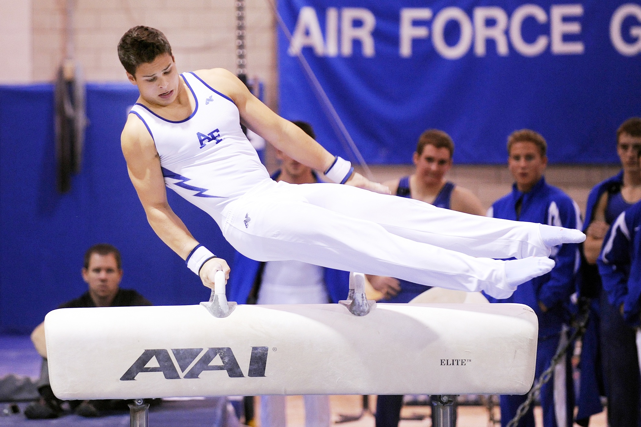 Male gymnasts from the air force on the pommel horse HD Wallpaper