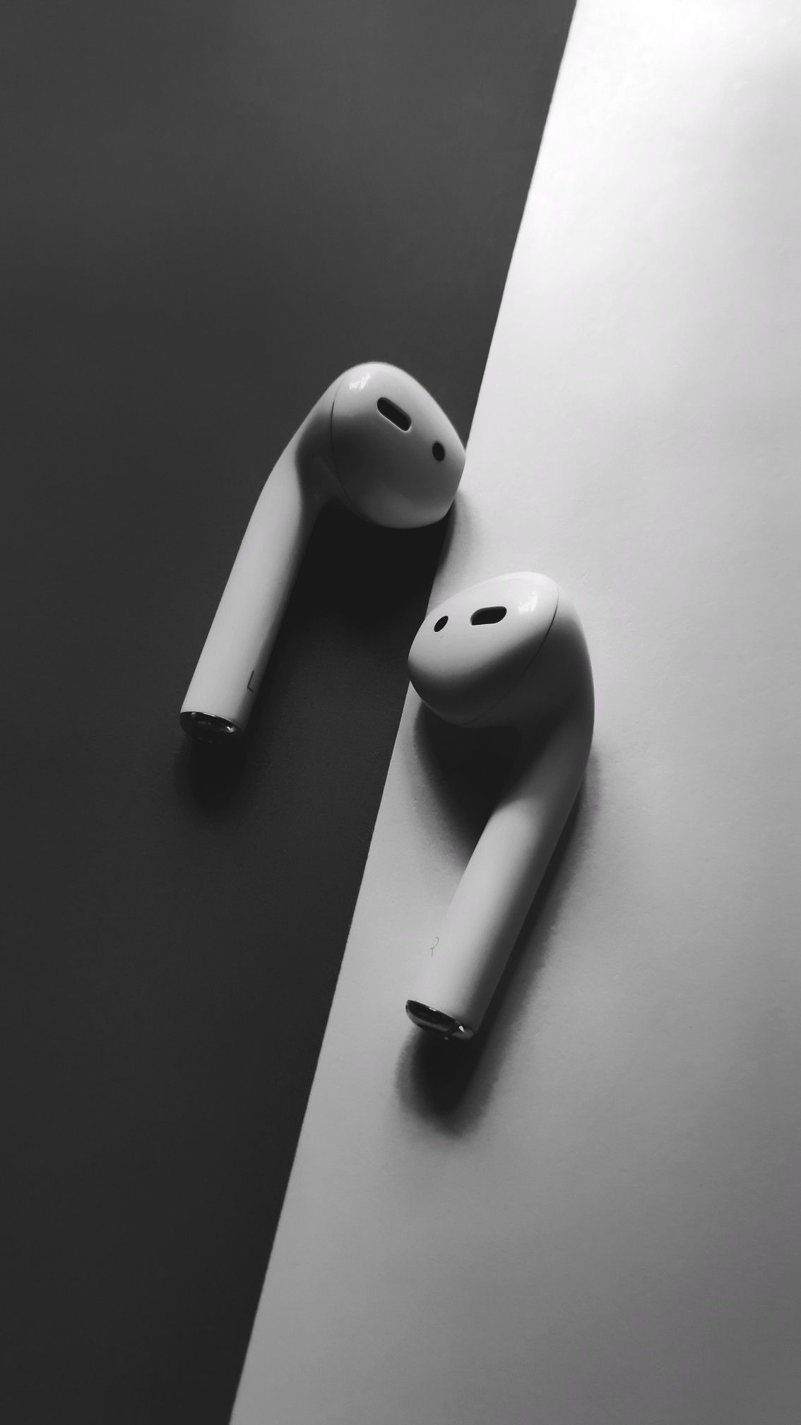White Apple airpods, headphones Wallpaper in black and white background. Wallpaper ph. Black and white background, Black phone wallpaper, Background HD wallpaper