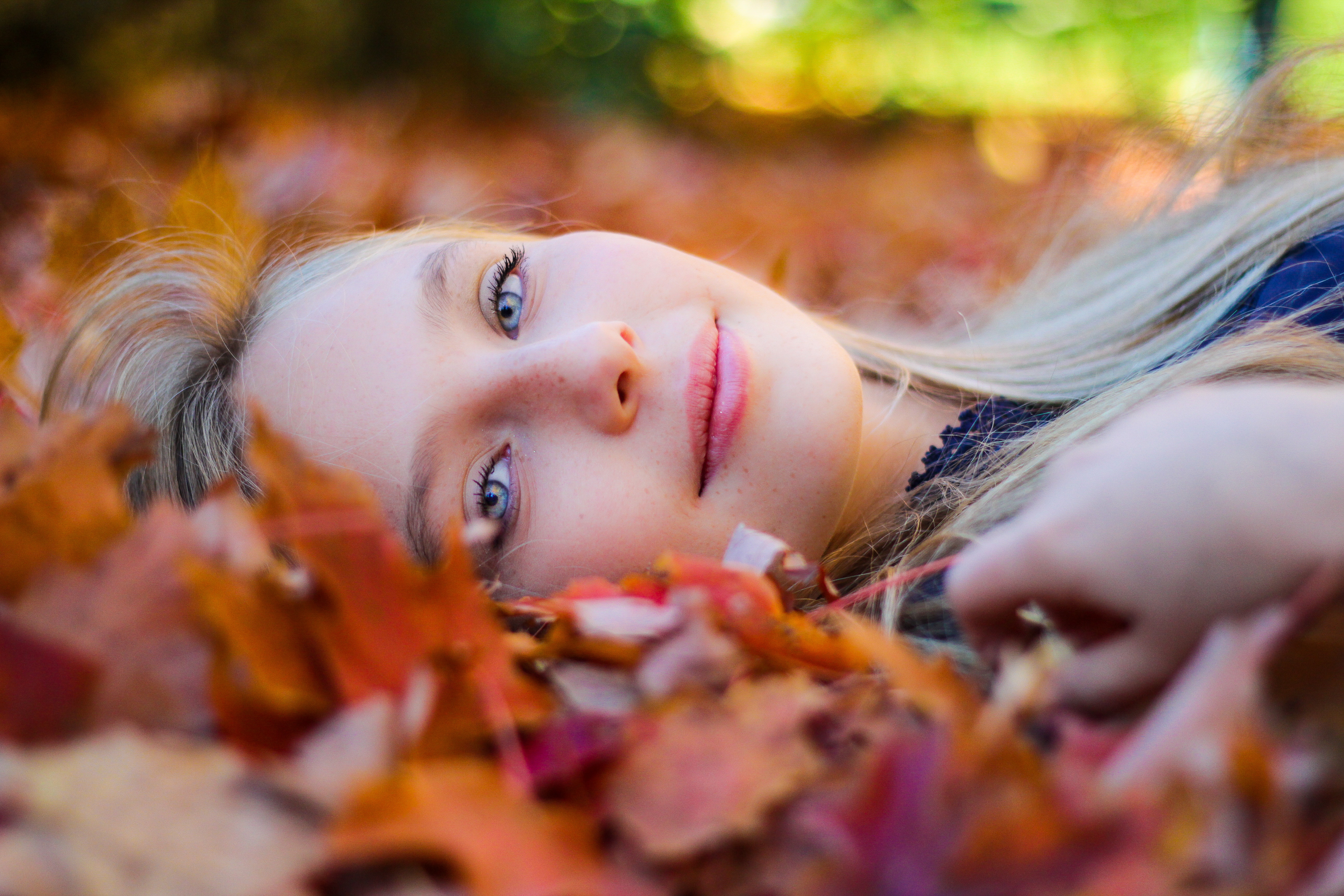 5184x3456 #blur, #blonde, #laying, #animal, #autumn, #person, #lifestyle, #fall, #season, #face, #smile, #lay, #leaf, #water, #october, #ground, #healthy, #portrait, #Free picture, #looking, #bokeh. Mocah HD Wallpaper