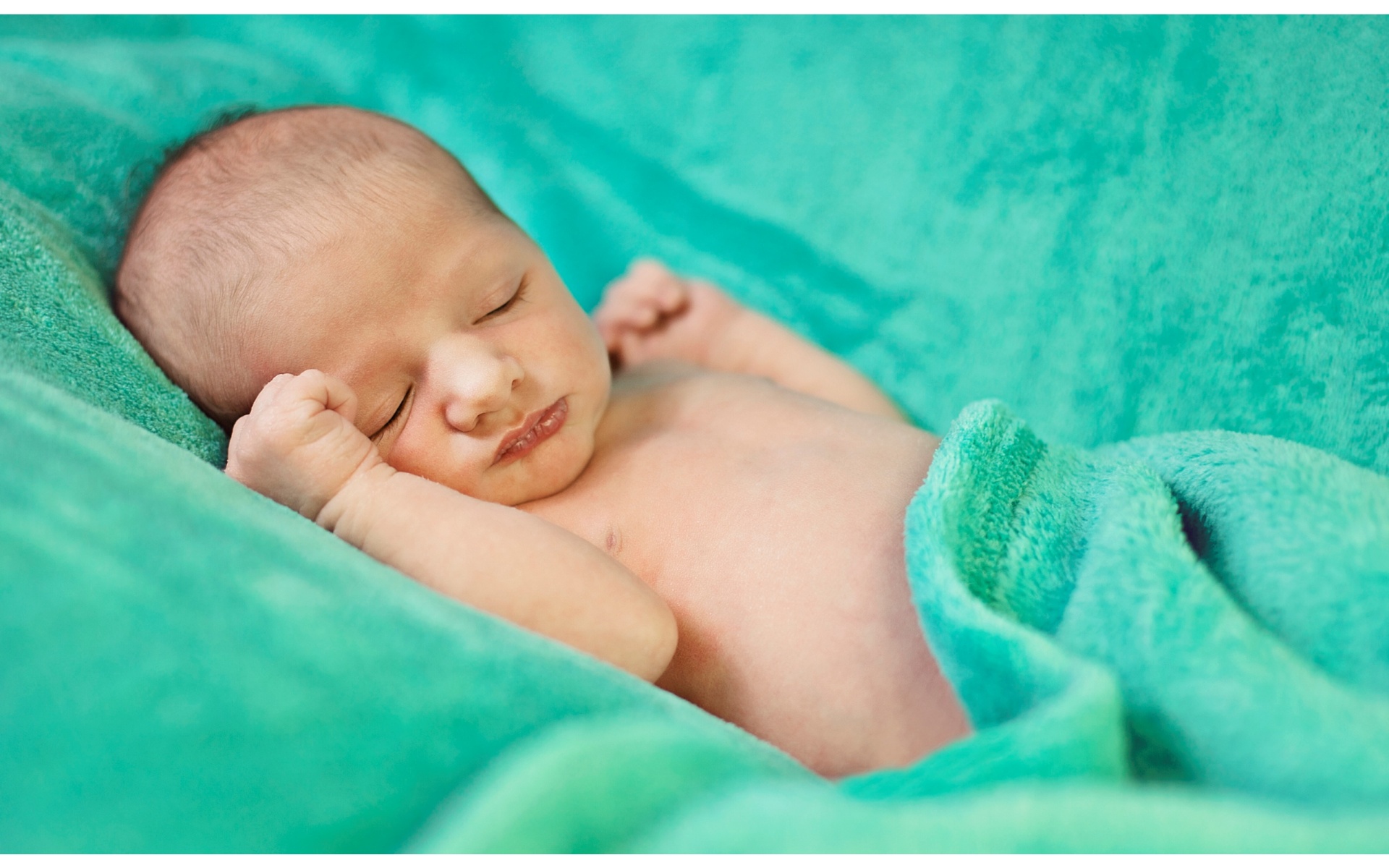 Sleeping Baby Green Background Wallpaper