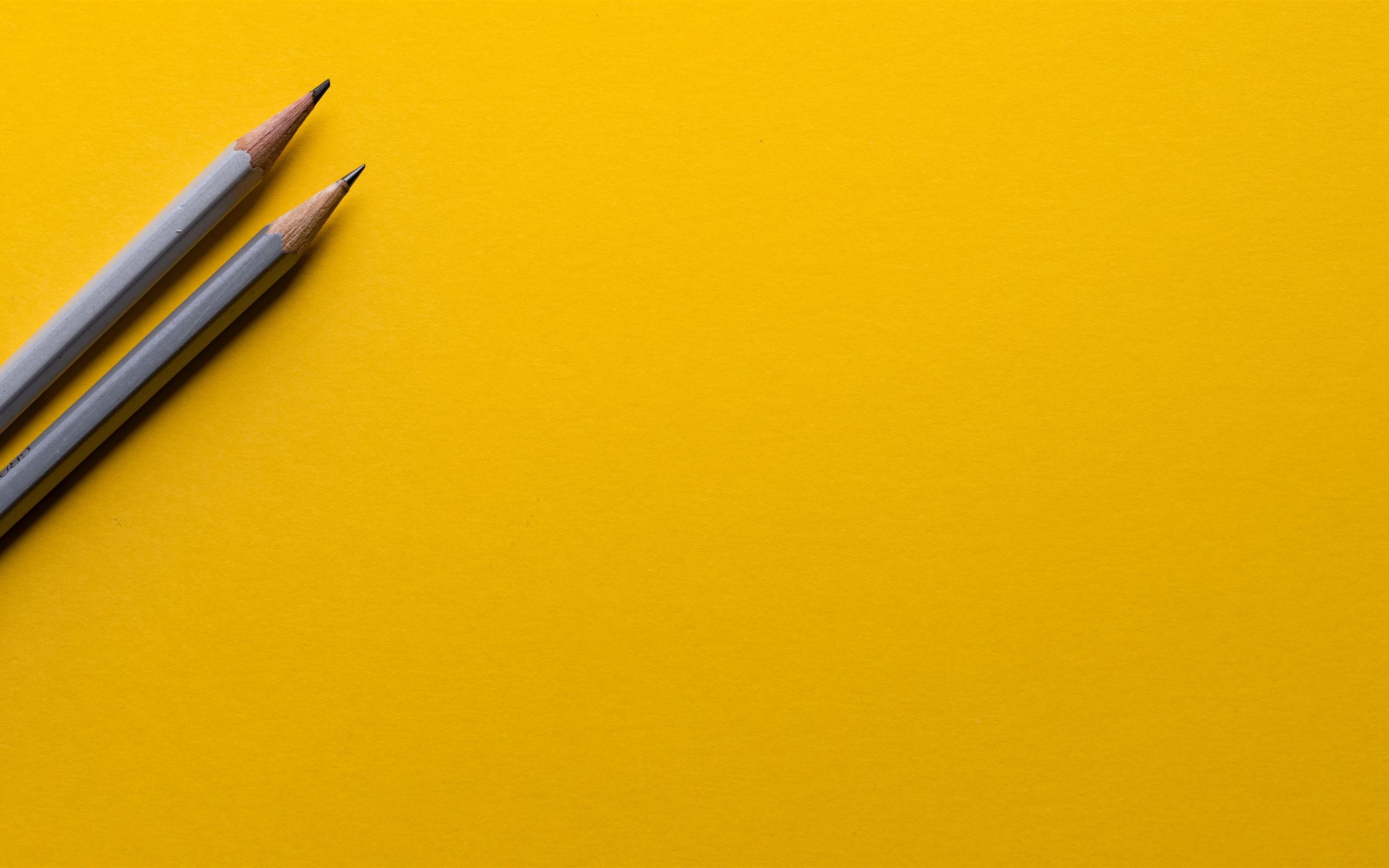Minimal pencils on yellow MacBook Air Wallpaper Download