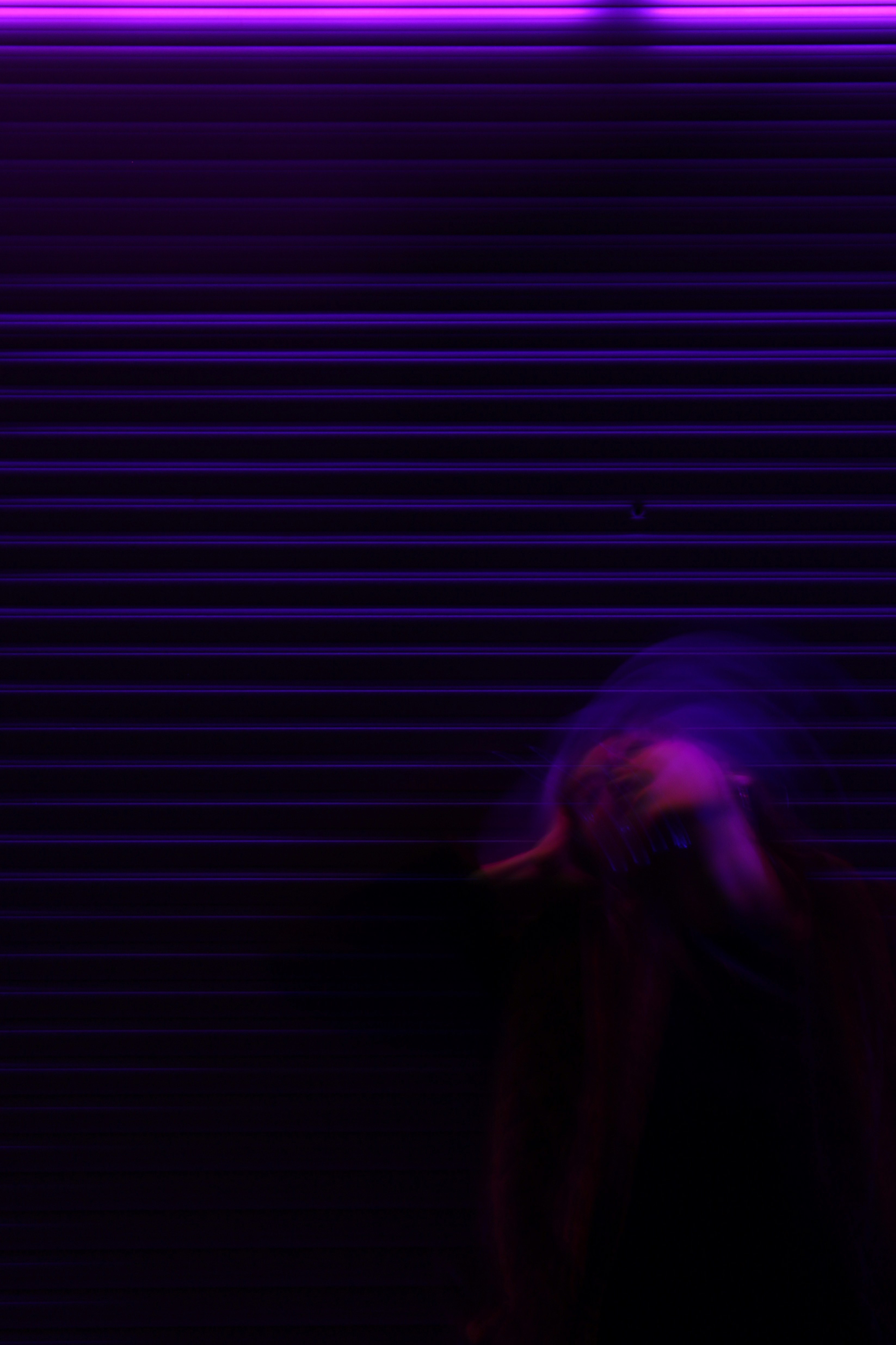 Wallpaper / a freaky shot of a woman tilting her head back standing in front of a garage door at night, _face 4k wallpaper