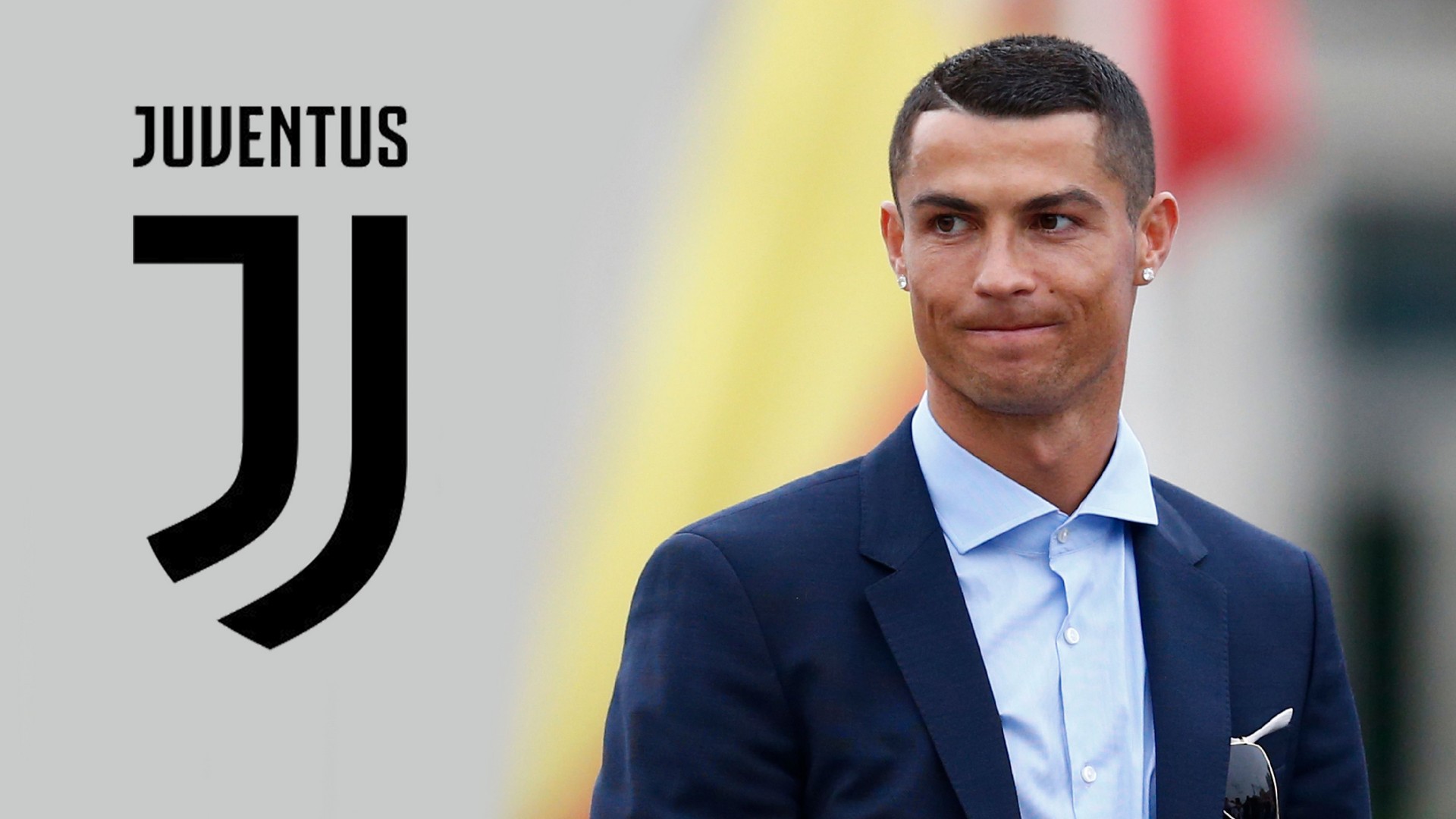 Ronaldo in a suit. Download Juventus FC Wallpaper