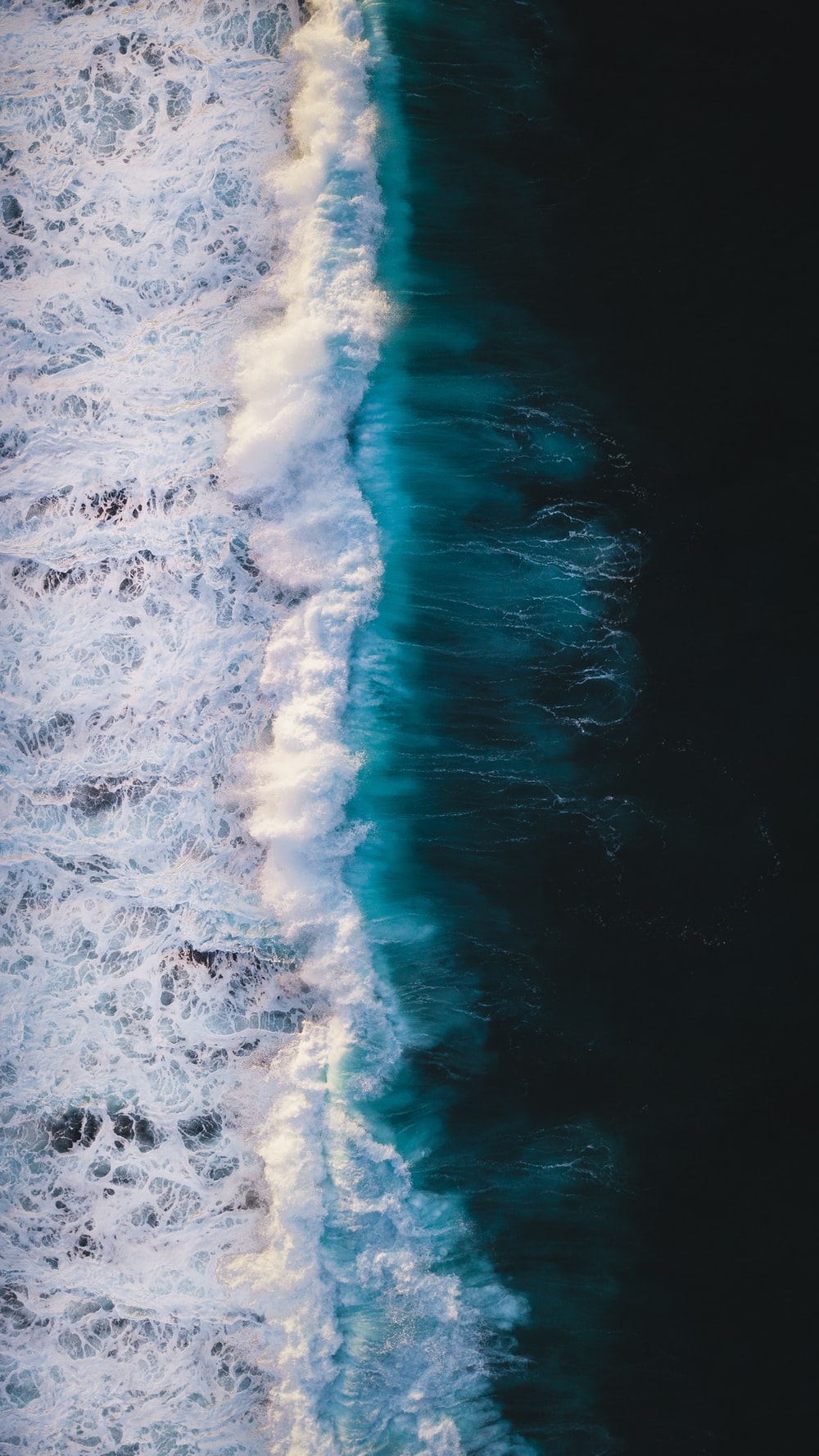 aerial view of ocean waves photo