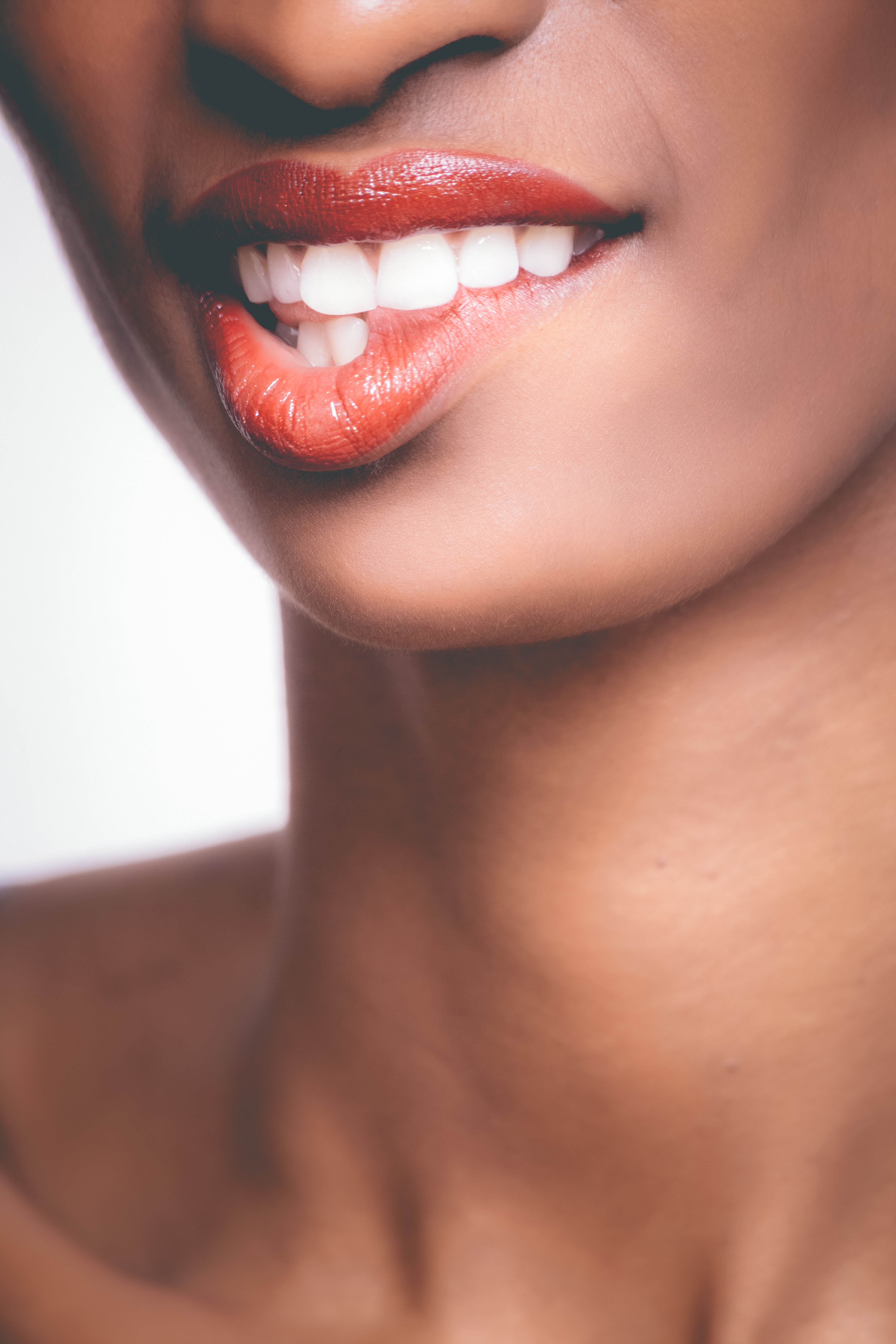Photo of Person Biting It's Own Red Lips · Free