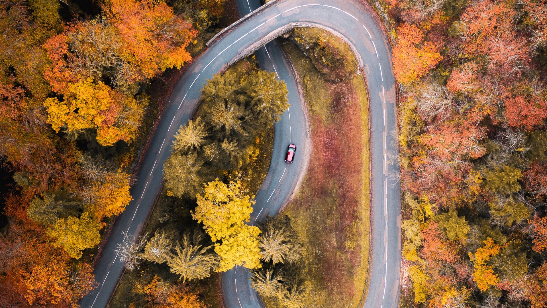 Download wallpaper 1920x1080 road, car, aerial view, trees, autumn full hd, hdtv, fhd, 1080p HD background