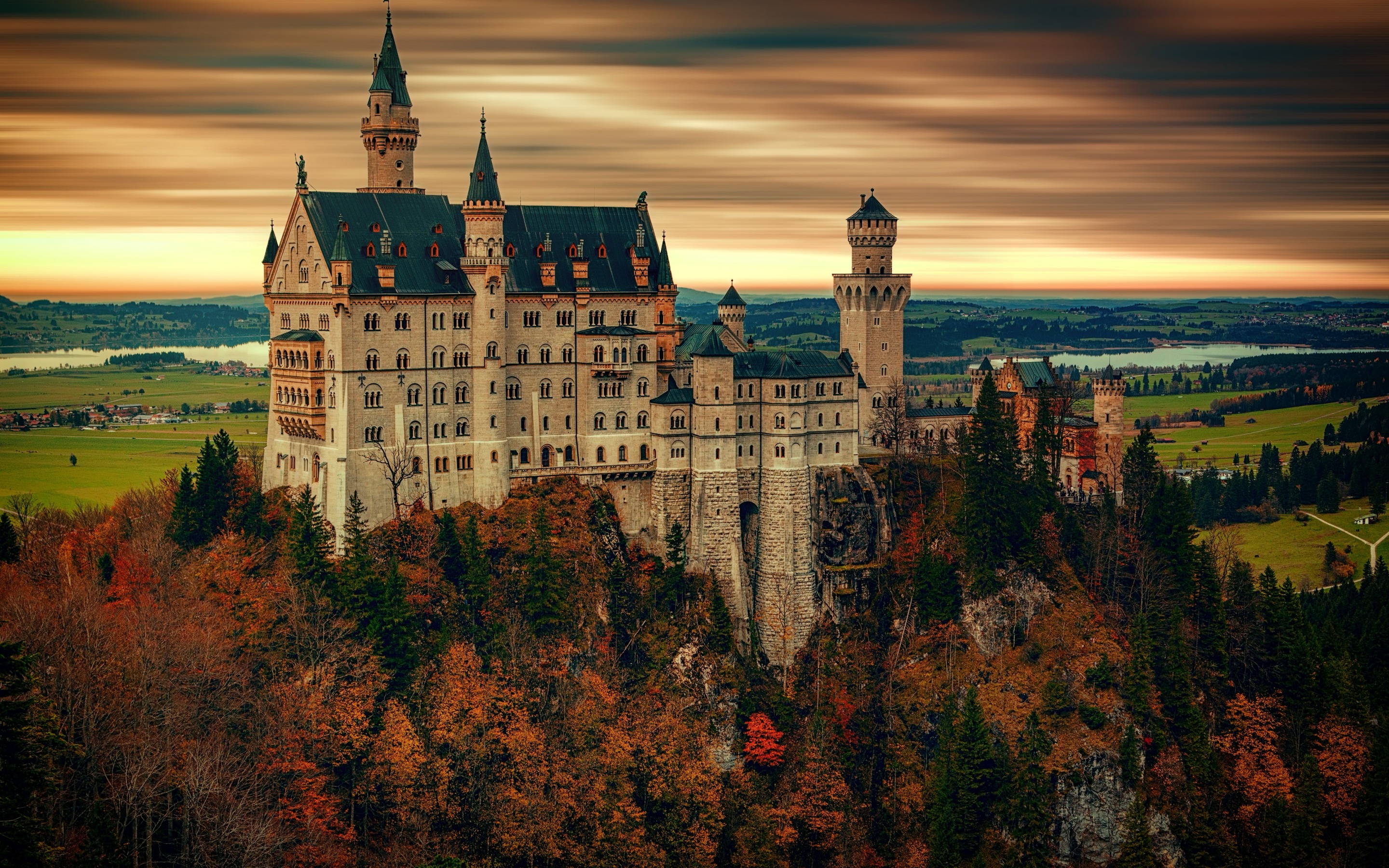 Download wallpaper Neuschwanstein Castle, autumn, forest, romantic castle, Landmark, skyline, Bavaria, Germany for desktop with resolution 2880x1800. High Quality HD picture wallpaper