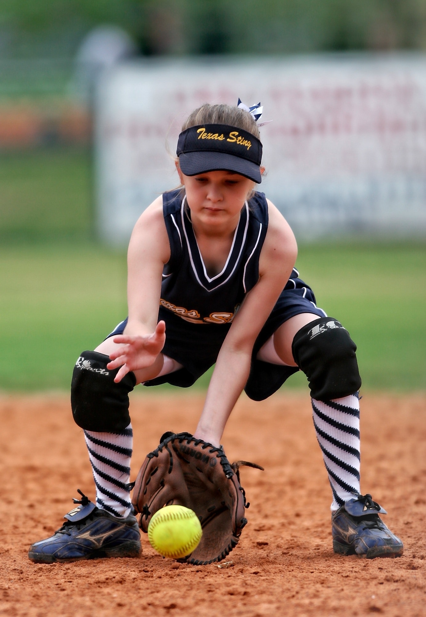 Softball Player About to Catch the Ball · Free