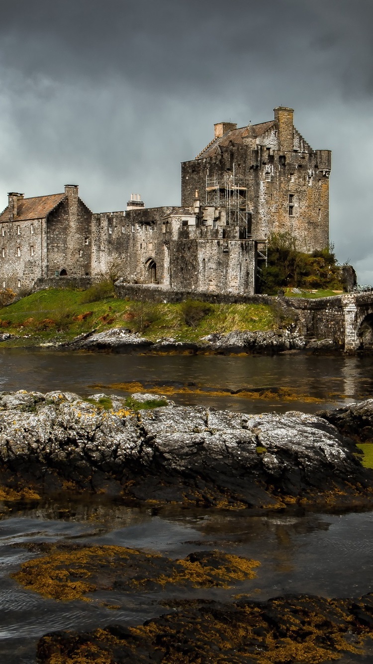 Eilean Donan Castle, Scotland, River, Stones, Clouds 750x1334 IPhone 8 7 6 6S Wallpaper, Background, Picture, Image