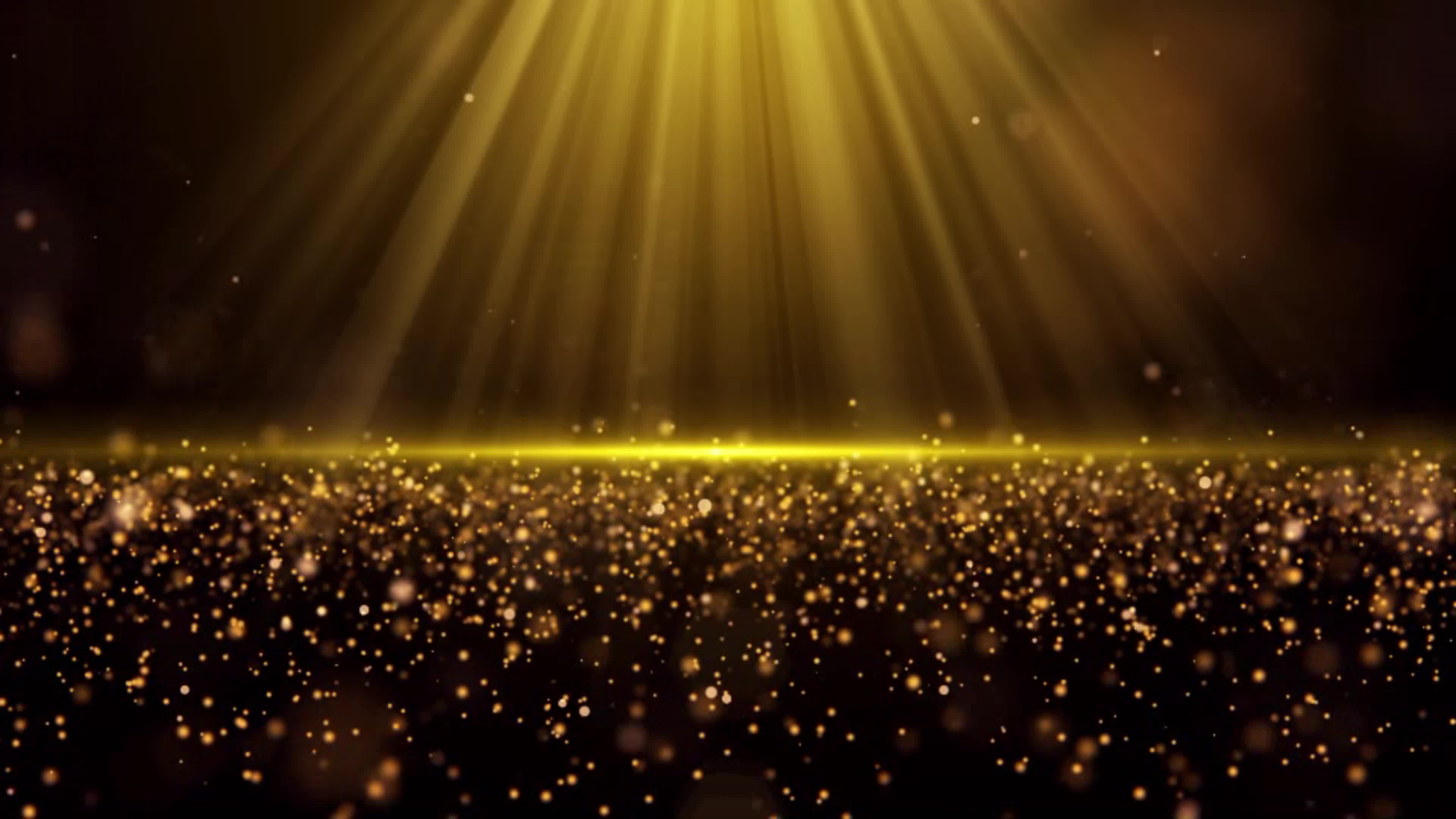 Light shining on gold dust particles