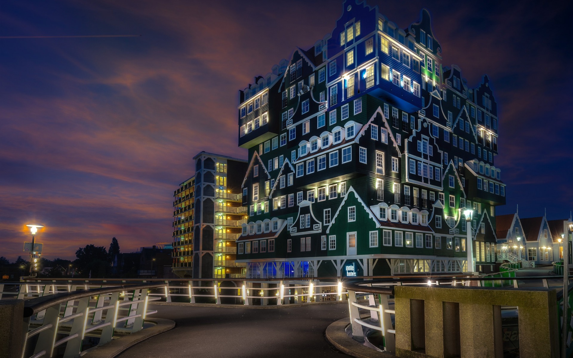 Download wallpaper Zaandam, hotel, North Holland, Netherlands, beautiful building, evening, city lights for desktop with resolution 1920x1200. High Quality HD picture wallpaper