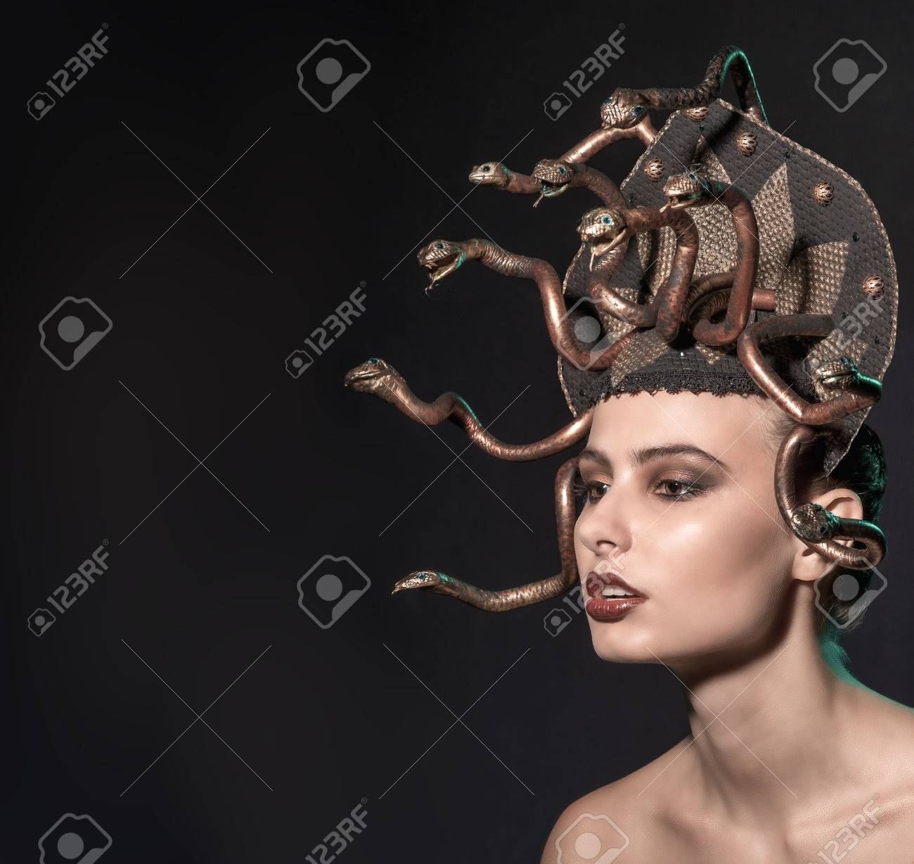 Free download Girl Medusa Headdress Of Gold Color On A Black Background Stock [1300x1228] for your Desktop, Mobile & Tablet. Explore Medusa Background. Medusa Background, Medusa Wallpaper, Smite Medusa Wallpaper