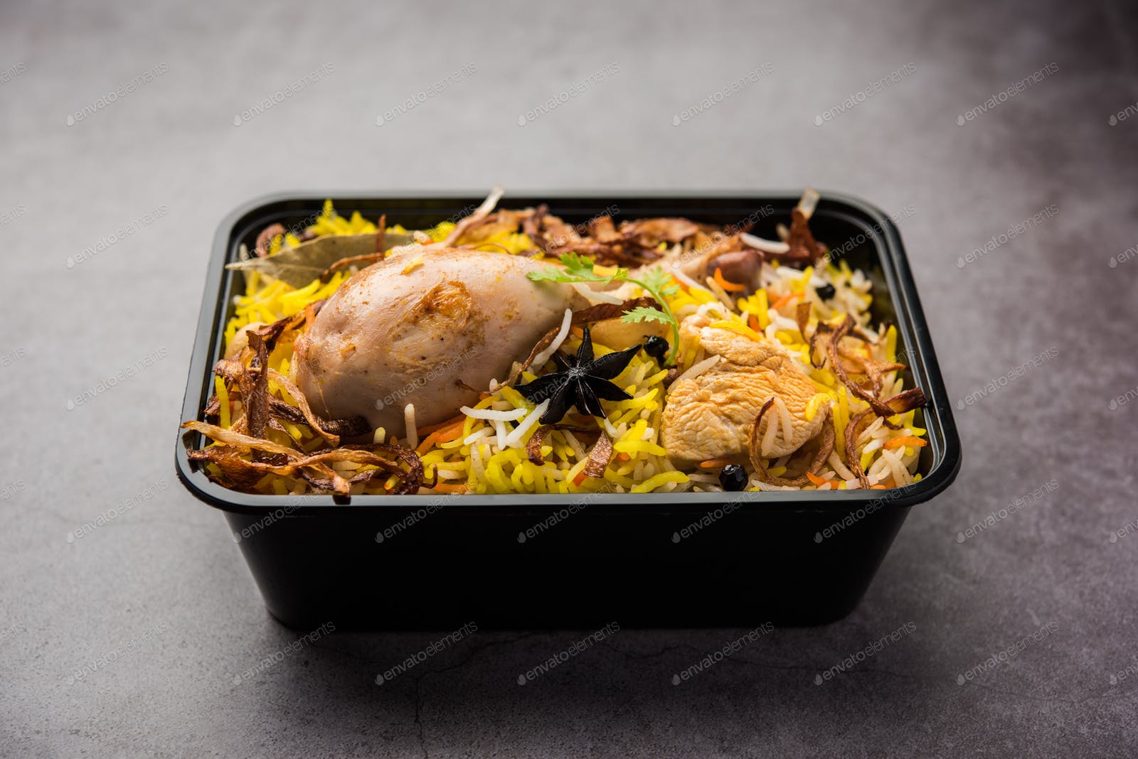 Online Food Delivery Biryani packed in Plastic box photo by stockimagefactory on Envato Elements