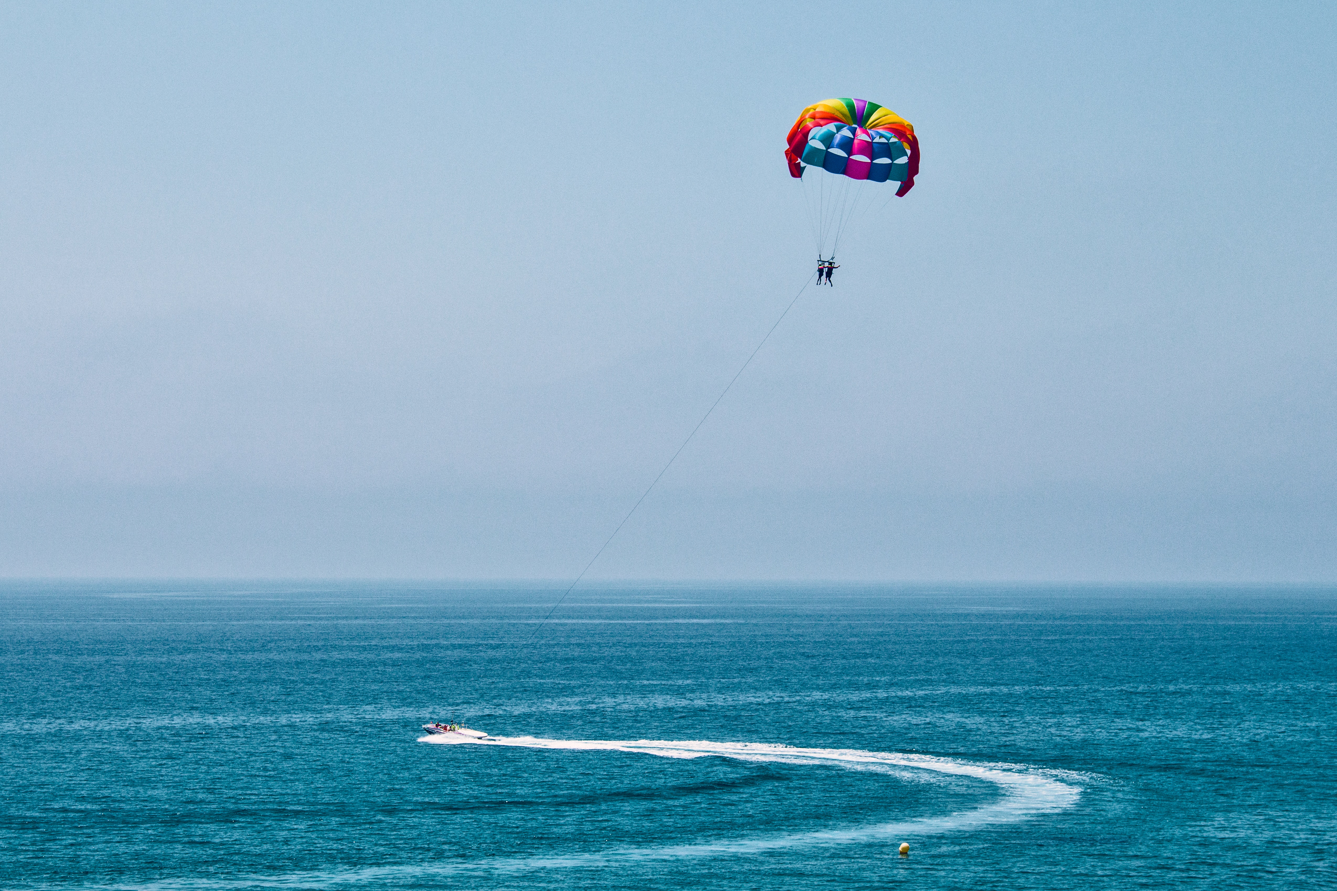 Two People Parasailing · Free