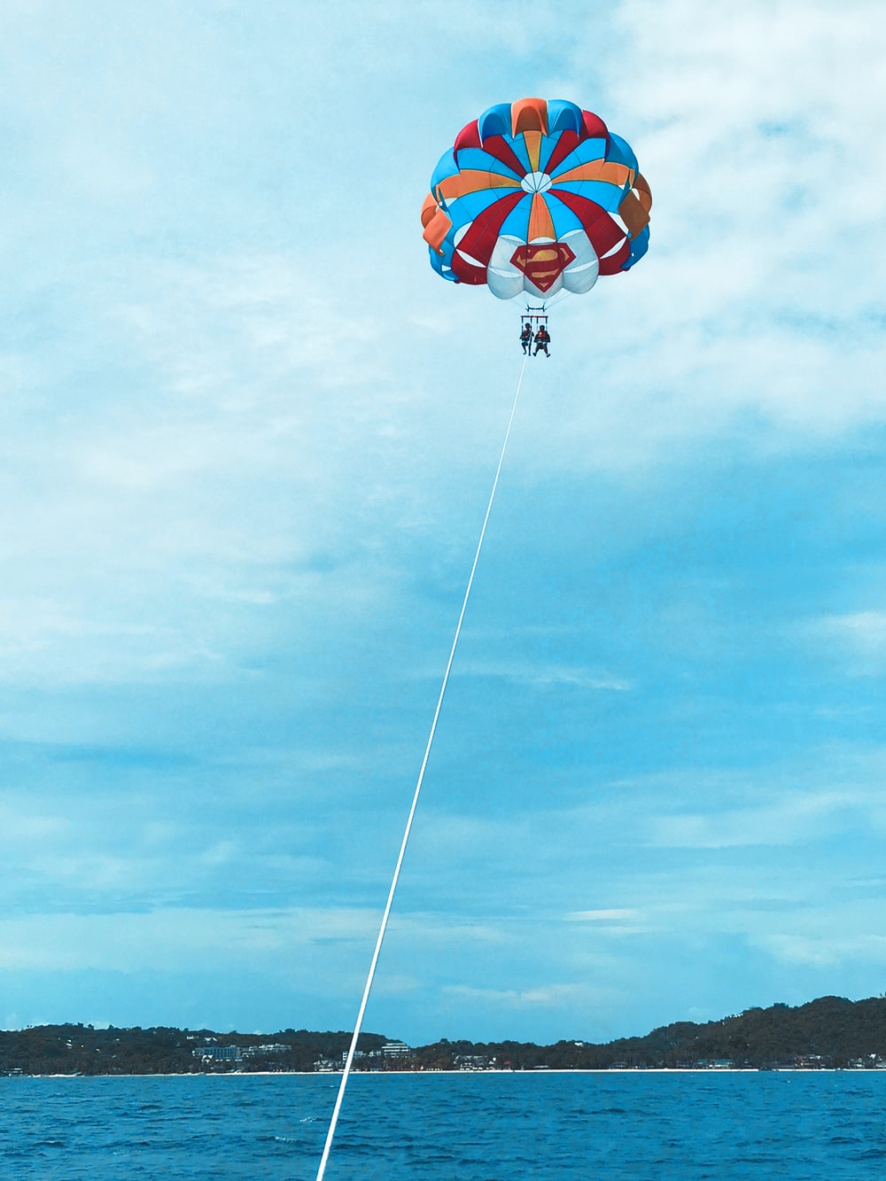 people parasailing photo