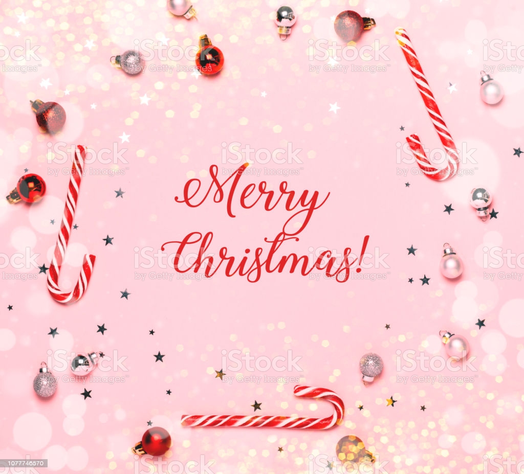 Merry Christmas Text On Pink Background With Christmas Decorations Image Now