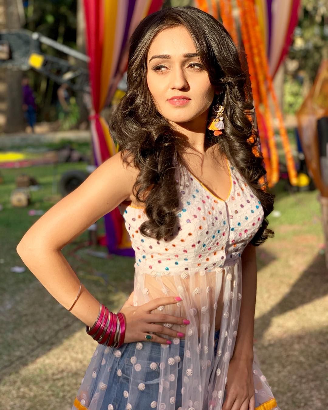 Image may contain: 1 person, standing and outdoor. Designer dresses indian, Stylish dress designs, Beautiful bollywood actress