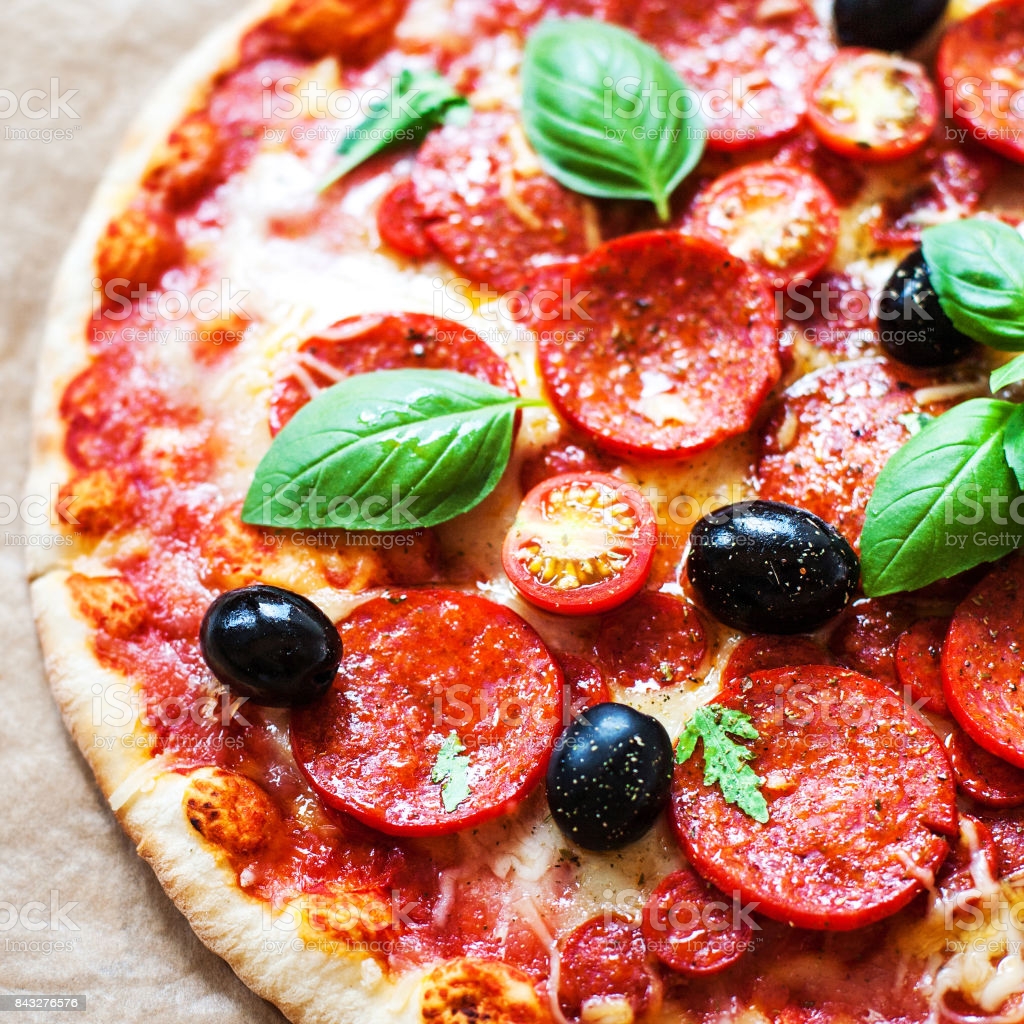 Pepperoni Pizza With Fresh Ingredients On Brown Baking Paper Background Top View Banner Or Wallpaper N Image Now