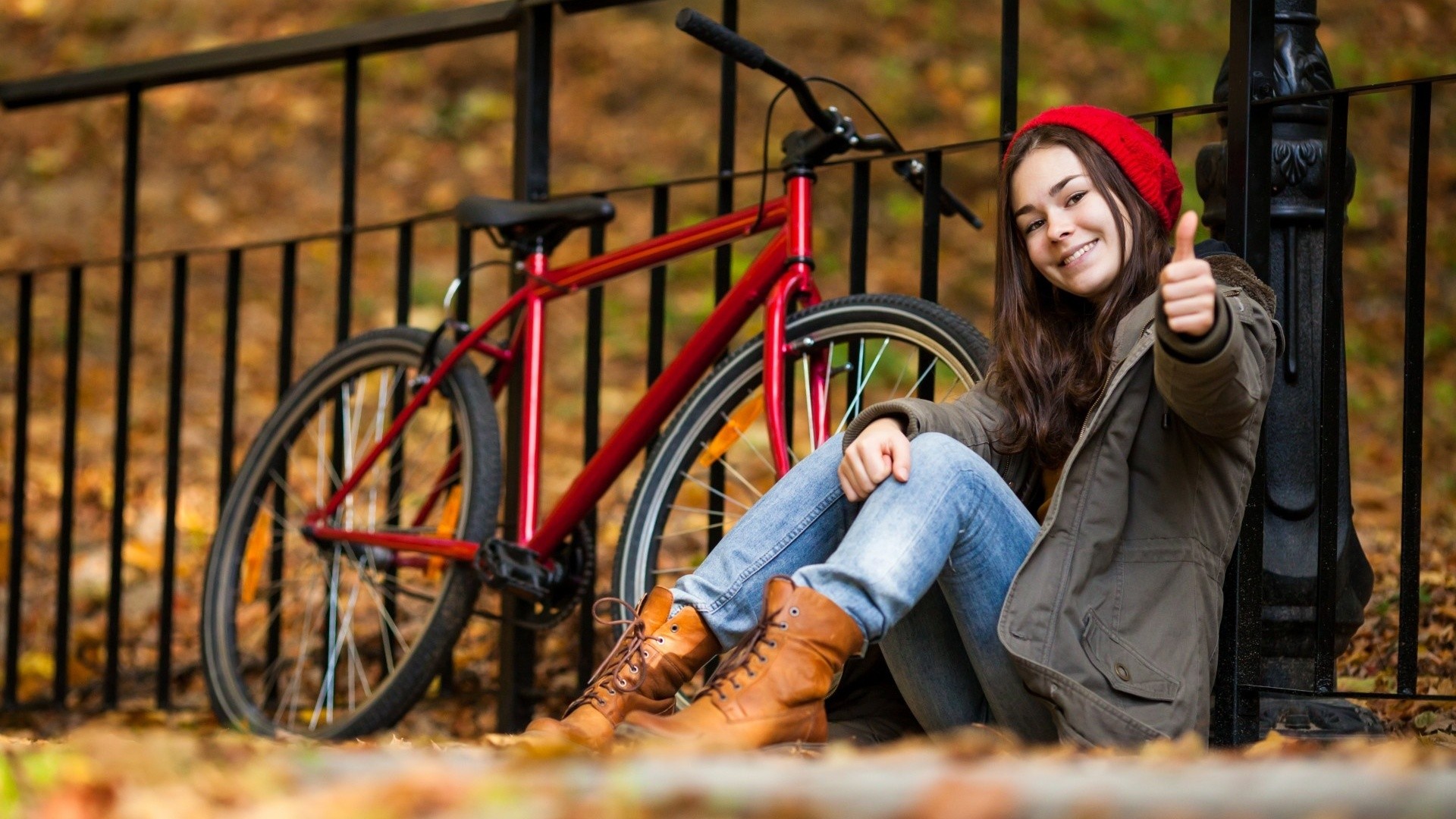 Wallpaper, fall, leaves, people, women outdoors, model, long hair, brunette, bicycle, hat, sitting, vehicle, smiling, coats, jeans, fence, boots, beanie, autumn, cyclo cross, sports equipment, mountain bike 1920x1080
