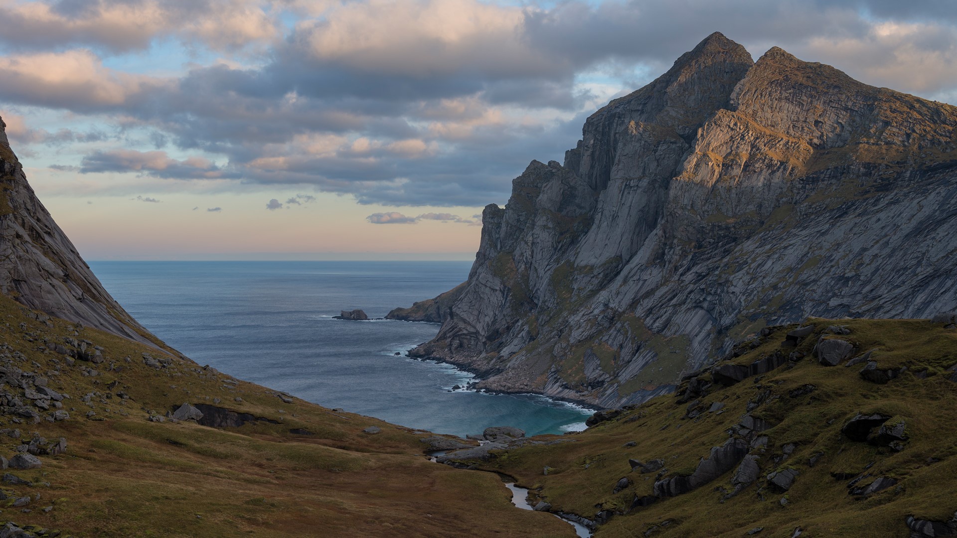 A stream in Trolldalen valley above Bunes beach, Moskenesøy, Lofoten Islands, Norway. Windows 10 Spotlight Image