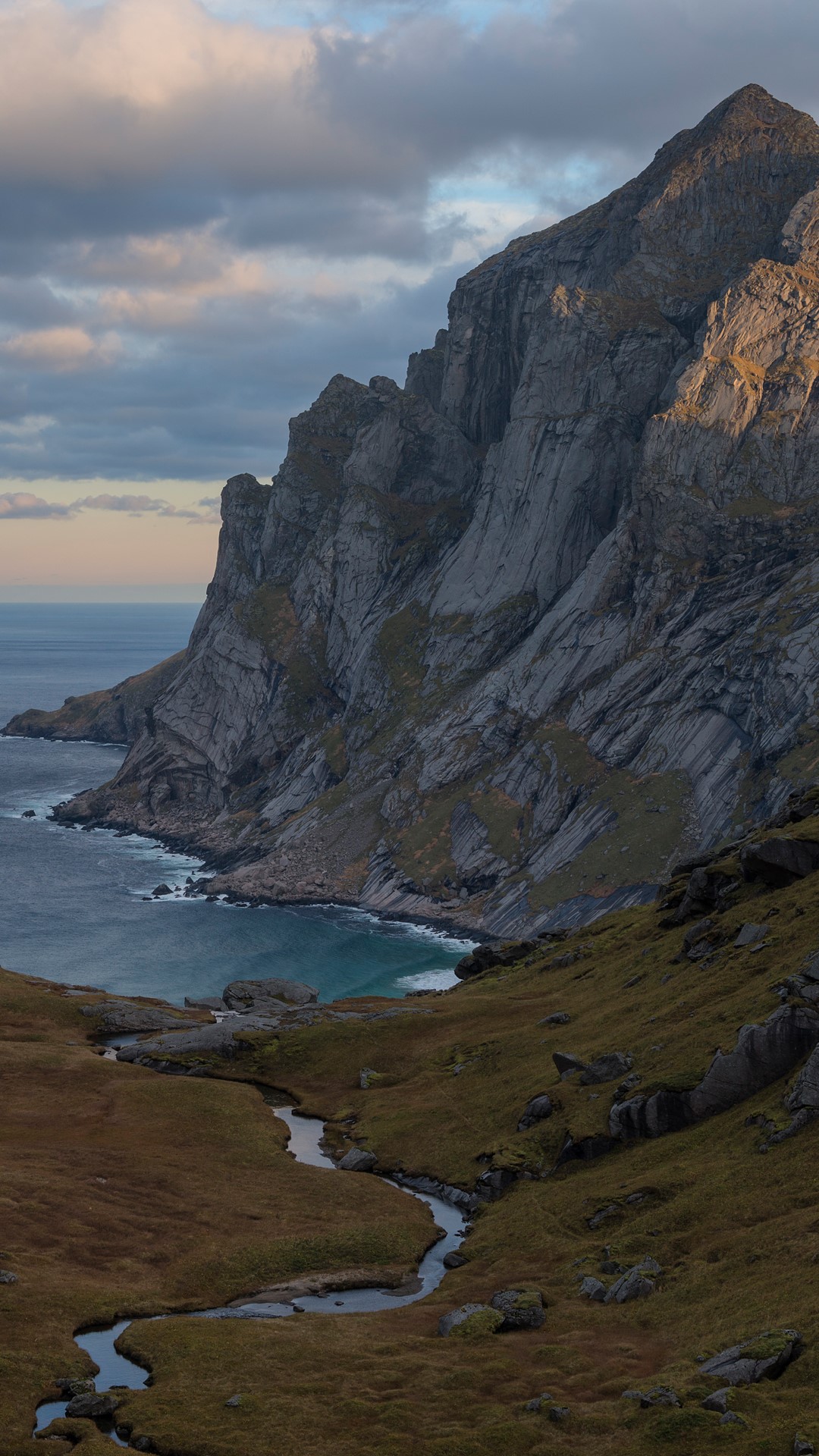 A stream in Trolldalen valley above Bunes beach, Moskenesøy, Lofoten Islands, Norway. Windows 10 Spotlight Image