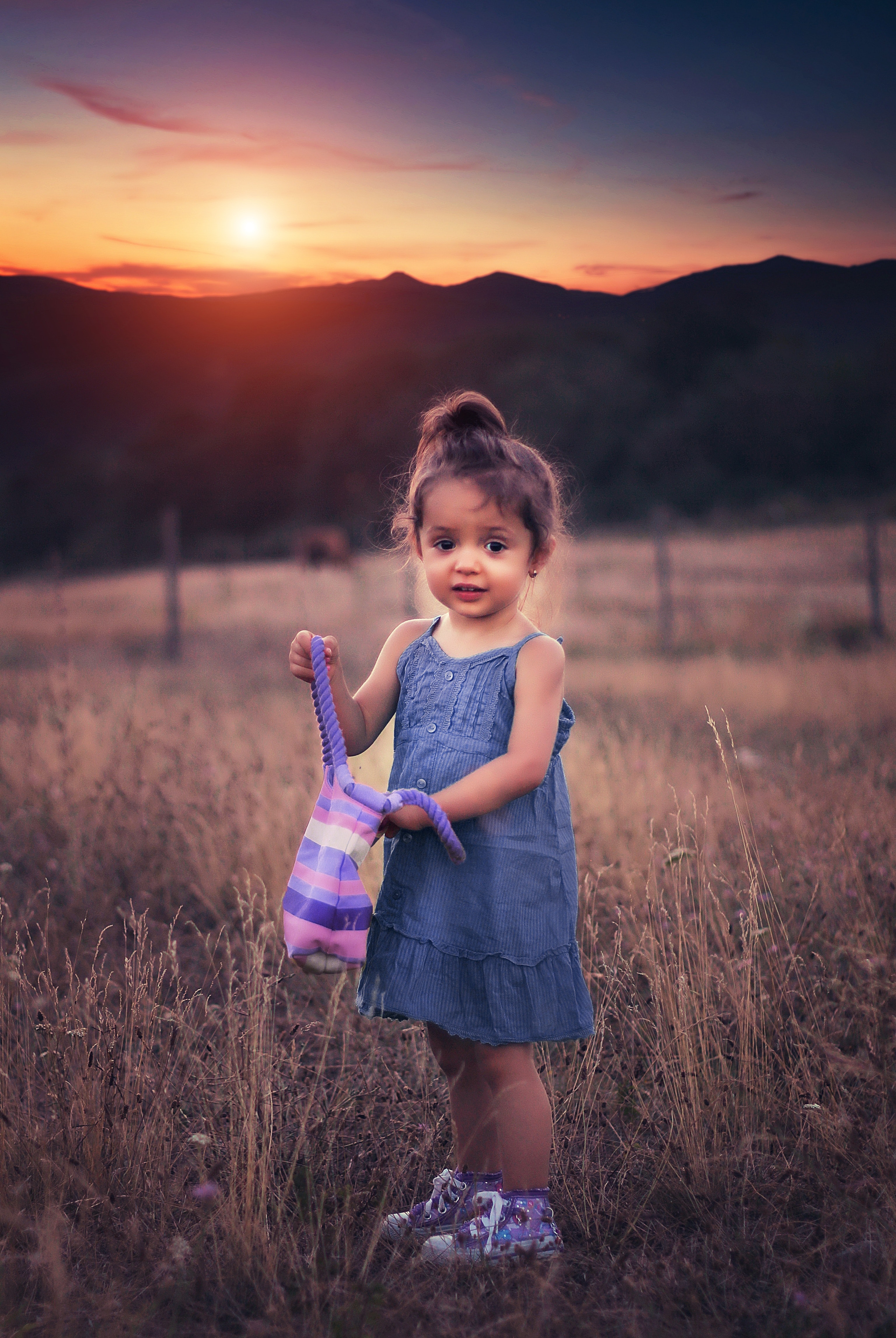 Girl in Blue Dress Standing on Grass Field during Sunset · Free