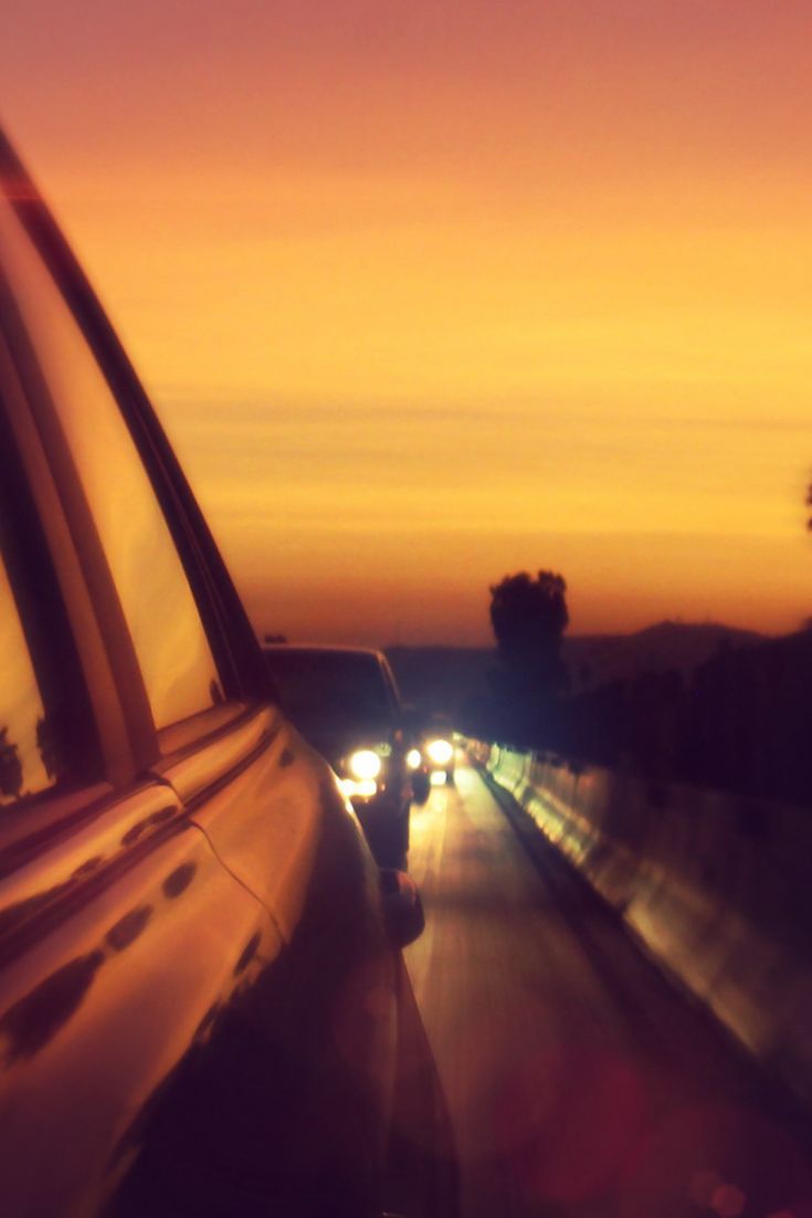 Download Driving Through Sun Set Wallpaper
