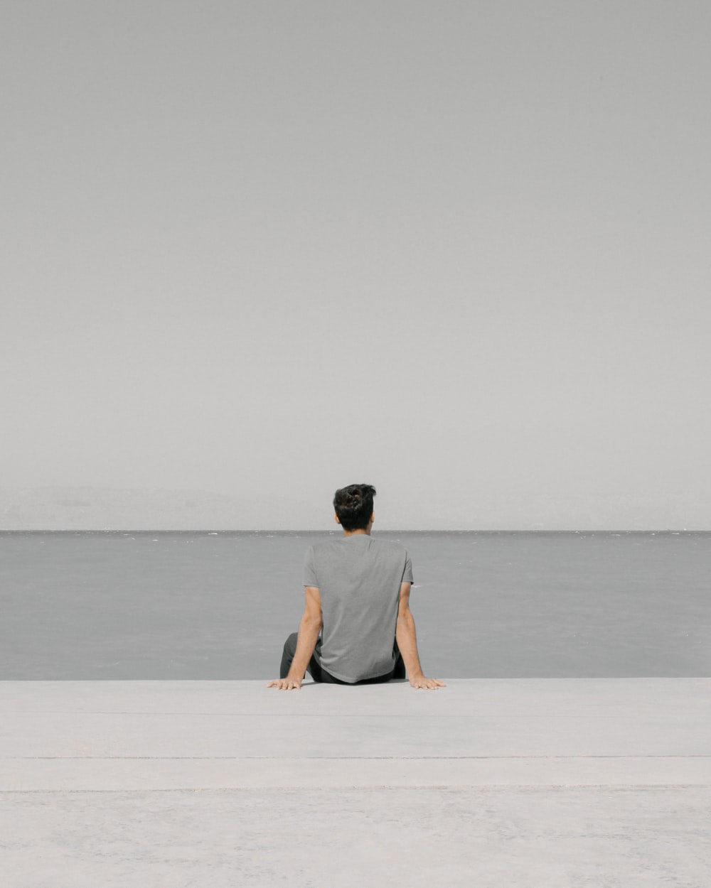 Man Sitting Alone Picture. Download Free Image