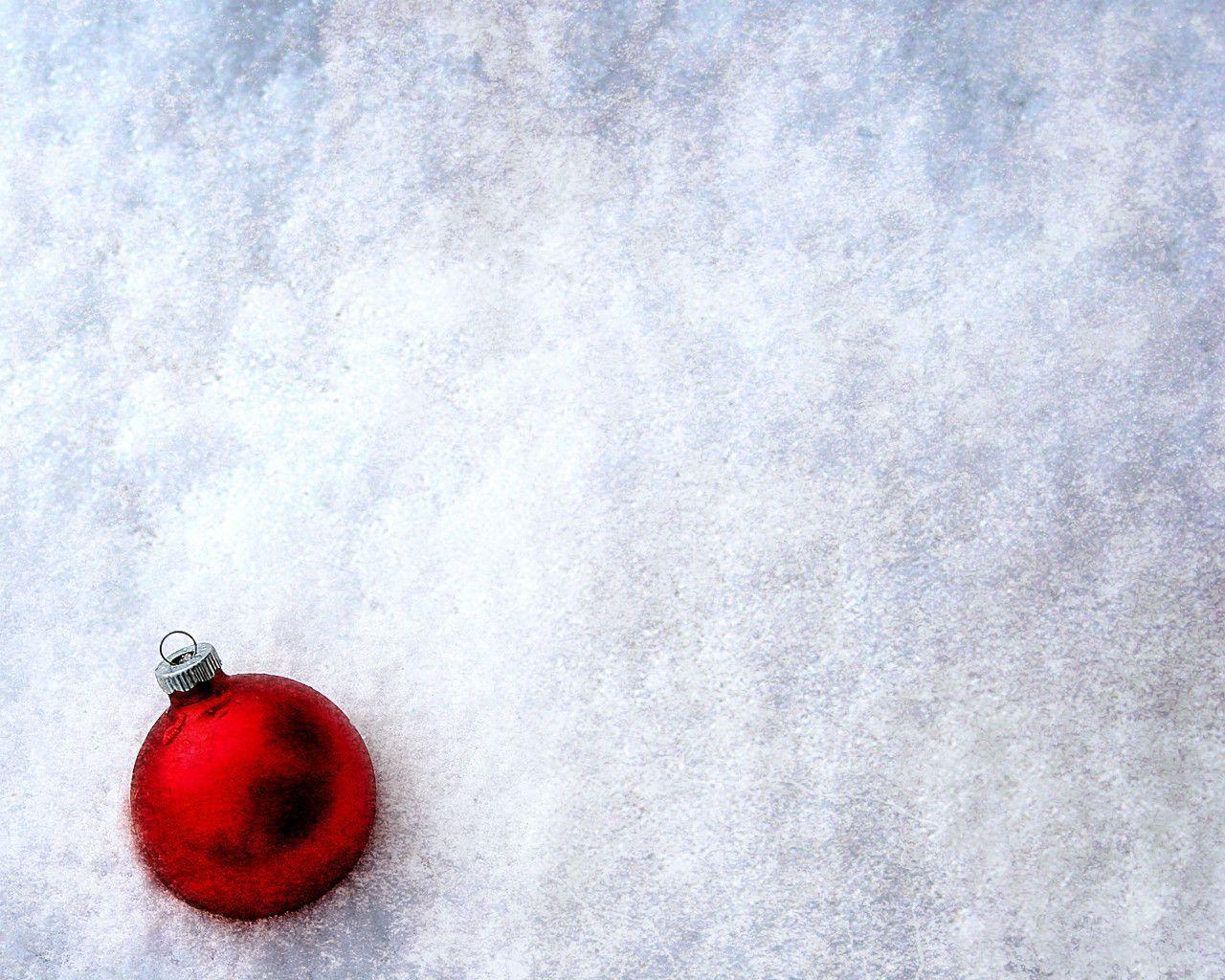 Red Ornament In The Snow: Holidays Wallpaper